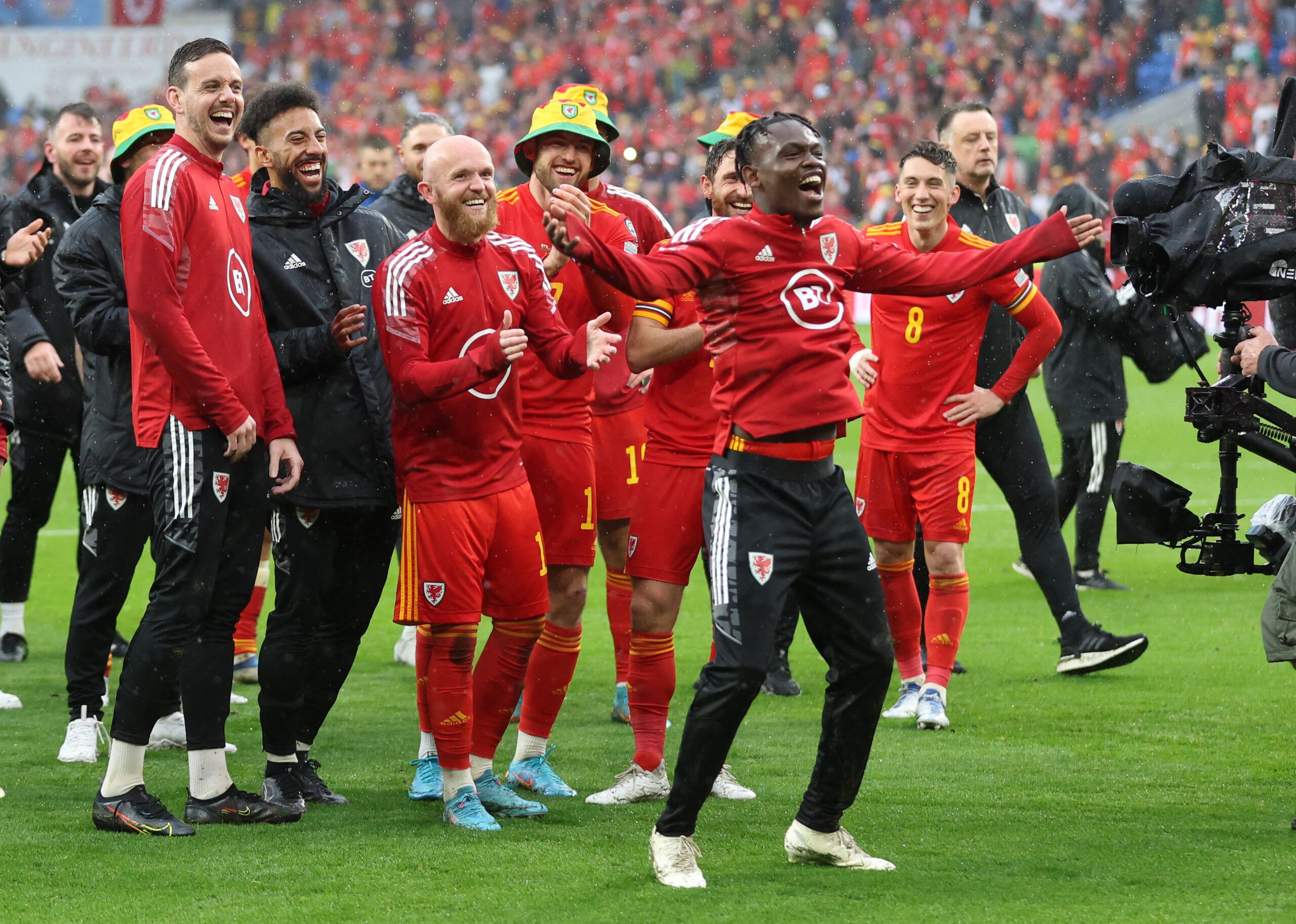 Soccer Football - FIFA World Cup - UEFA Qualifiers - Final - Wales v Ukraine - Cardiff City Stadium, Cardiff, Wales, Britain - June 5, 2022 Wales' Rabbi Matondo celebrates with teammates after qualifying for the World Cup Action Images via Reuters/Matthew Childs