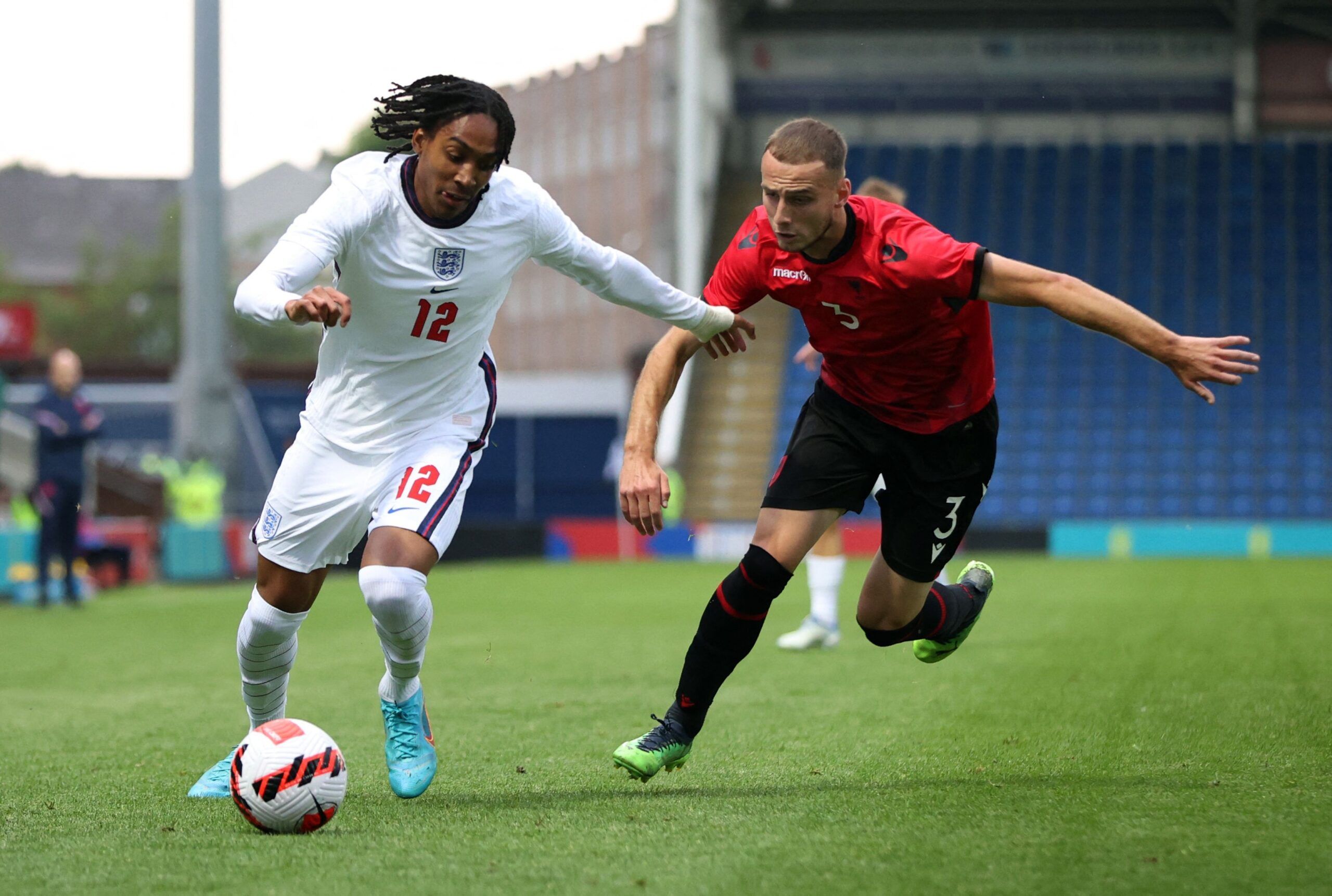 Soccer Football - European Under-21 Championship Qualifying - Group G - England v Albania - Technique Stadium, Chesterfield, Britain - June 7, 2022 England's Djed Spence in action with Albania's Mario Mitaj Action Images via Reuters/Molly Darlington