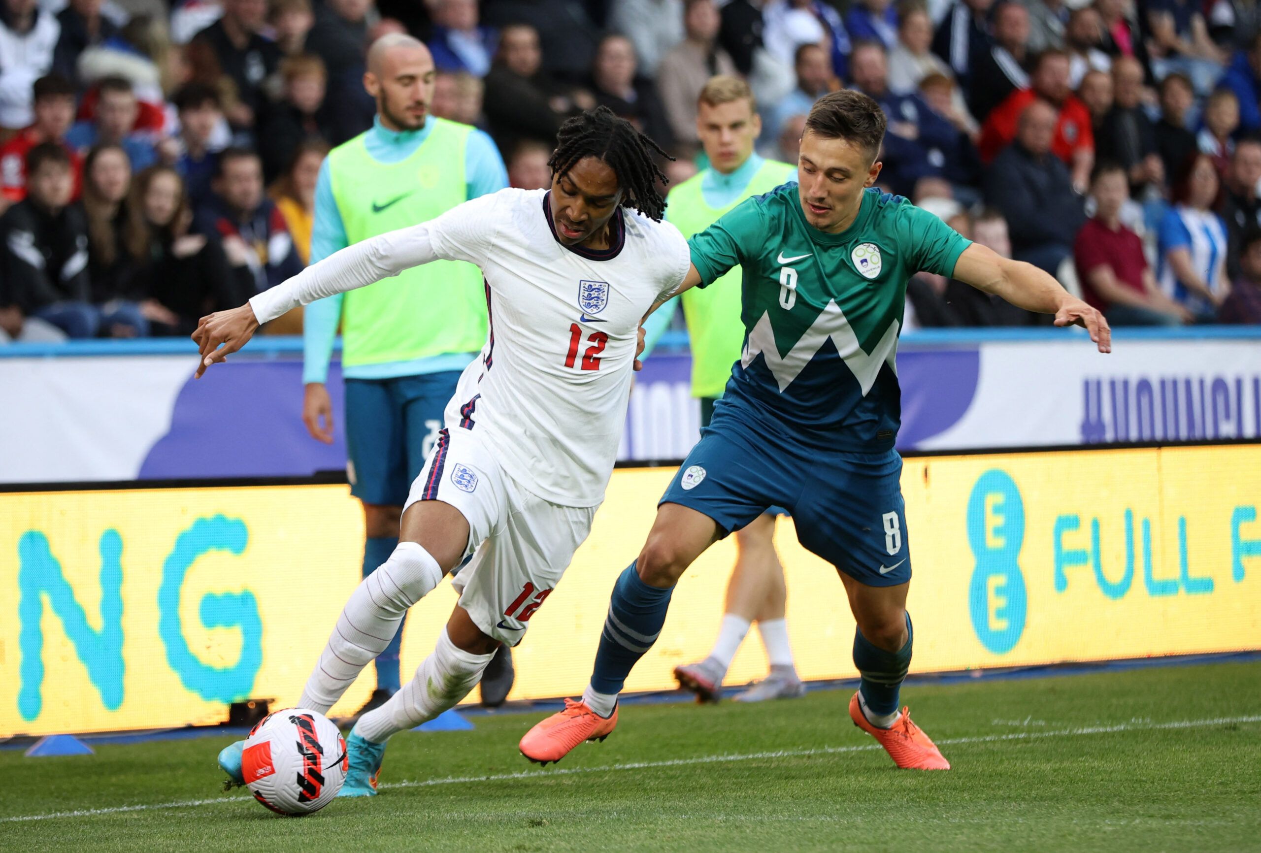Soccer Football - European Under-21 Championship Qualifying - England v Slovenia - The John Smith's Stadium, Huddersfield, Britain - June 13, 2022 England's Djed Spence in action with Slovenia's Luka Ticic Action Images via Reuters/Molly Darlington