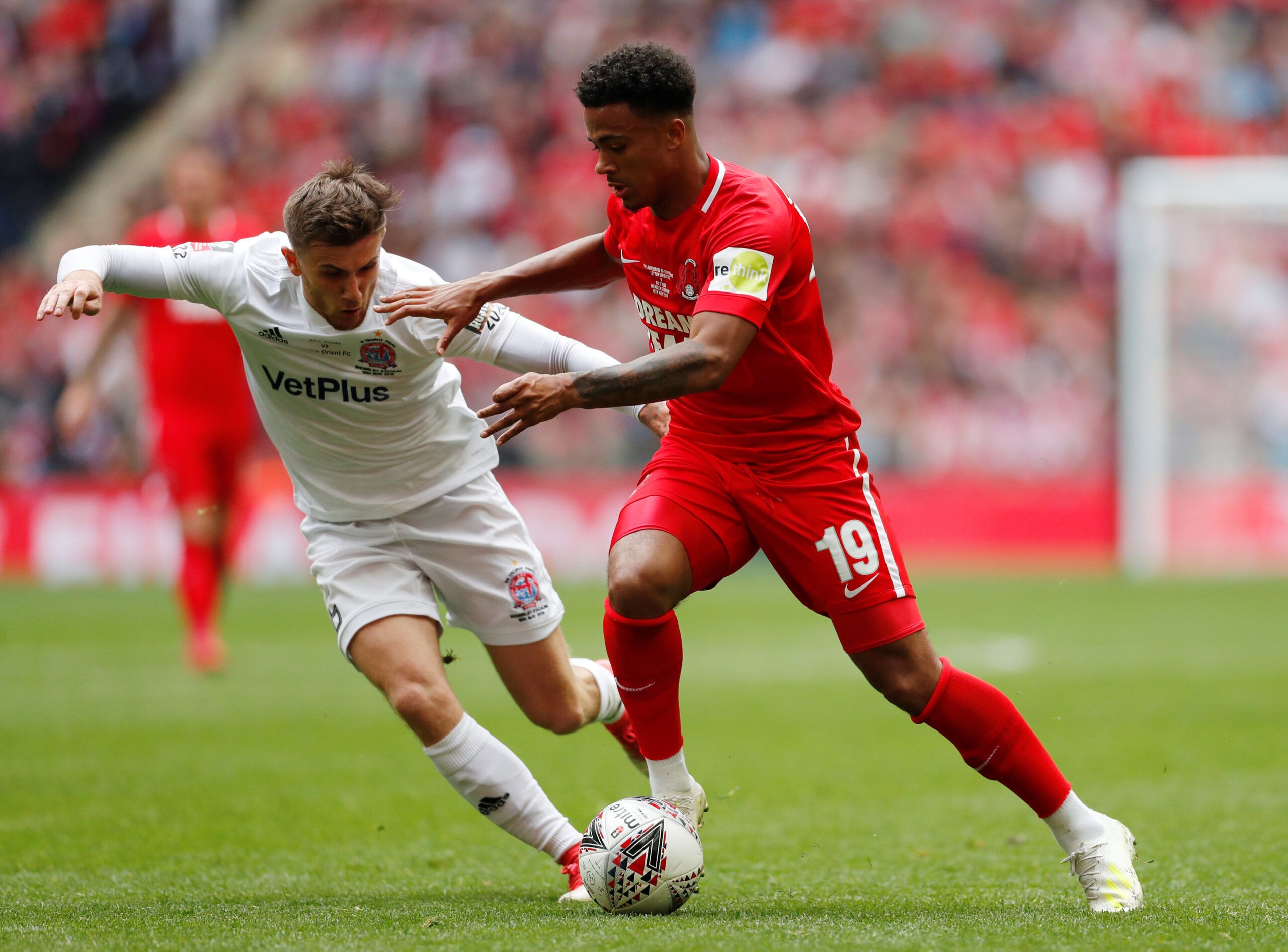 Soccer Football - FA Trophy Final - AFC Fylde v Leyton Orient - Wembley Stadium, London, Britain - May 19, 2019   Andy Bond of AFC Fylde in action with Josh Koroma of Leyton Orient    Action Images/Matthew Childs