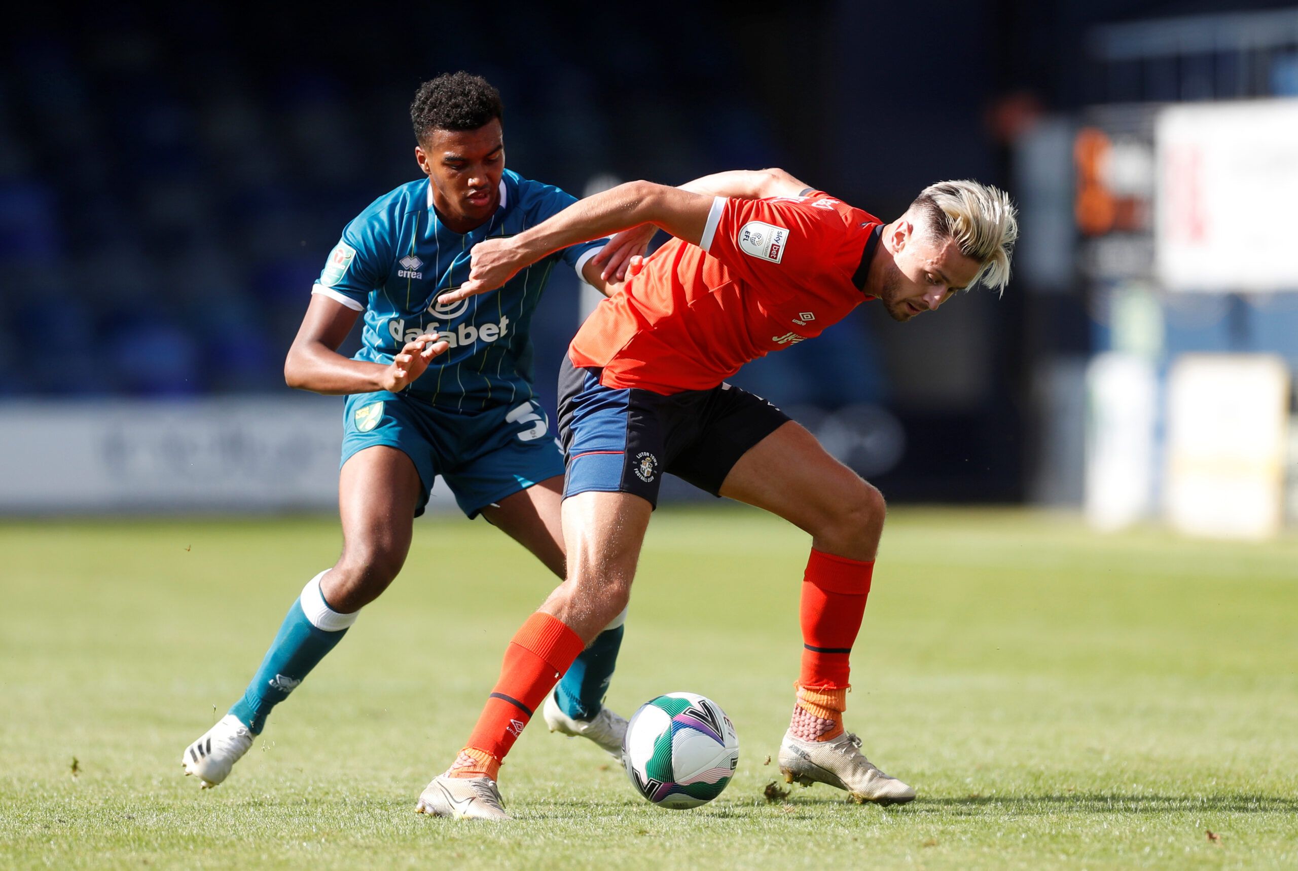 Soccer Football - Carabao Cup First Round - Luton Town v Norwich City - Kenilworth Road, Luton, Britain - September 5, 2020   Luton Town's Harry Cornick in action with Norwich City's Sam McCallum     Action Images/Matthew Childs