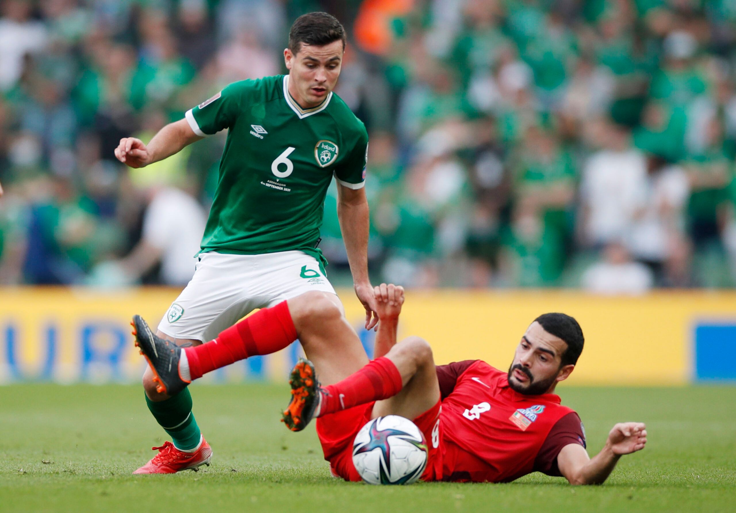 Soccer Football - World Cup - UEFA Qualifiers - Group A - Republic of Ireland v Azerbaijan - Aviva Stadium, Dublin, Ireland - September 4, 2021  Republic of Ireland's Josh Cullen in action with Azerbaijan's Emin Makhmudov Action Images via Reuters/Paul Childs