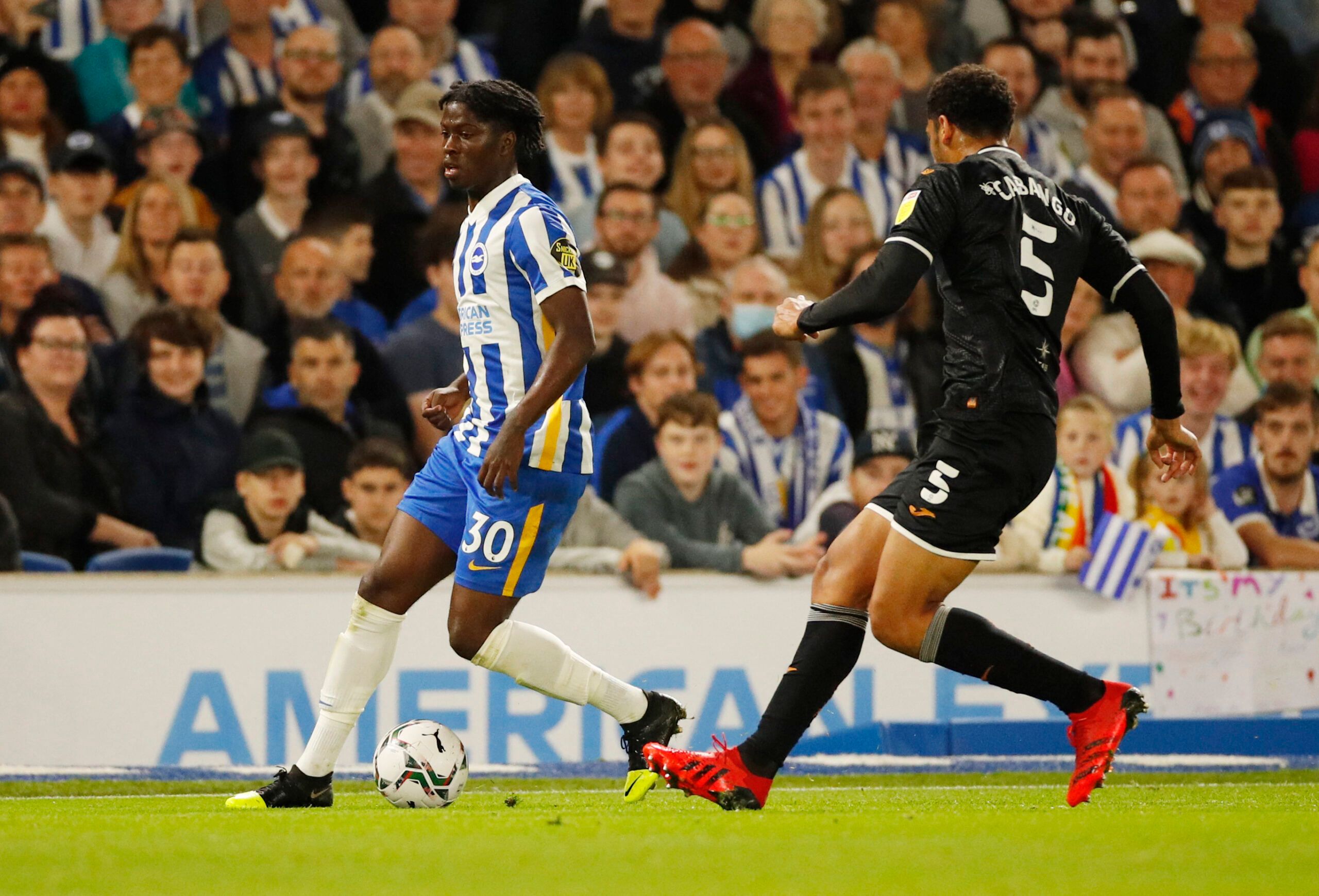 Soccer Football - Carabao Cup - Third Round - Brighton &amp; Hove Albion v Swansea City - The American Express Community Stadium, Brighton, Britain - September 22, 2021 Brighton &amp; Hove Albion's Taylor Richards in action with Swansea City's Ben Cabango Action Images via Reuters/Andrew Boyers EDITORIAL USE ONLY. No use with unauthorized audio, video, data, fixture lists, club/league logos or 'live' services. Online in-match use limited to 75 images, no video emulation. No use in betting, games