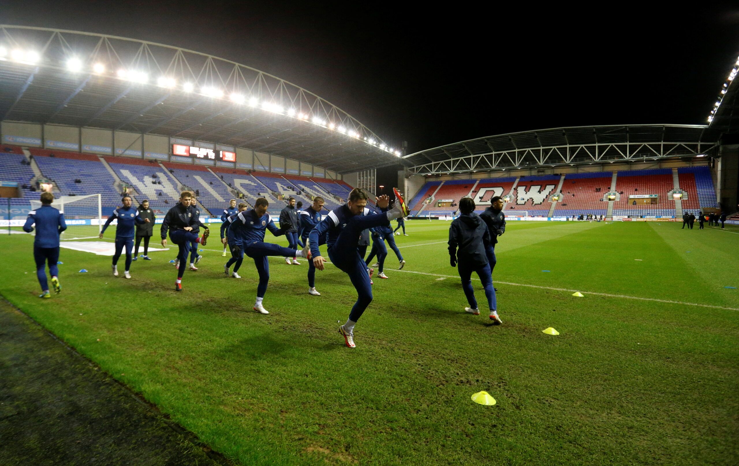 Soccer Football - League One - Wigan Athletic v Shrewsbury Town - DW Stadium, Wigan, Britain - December 8, 2021  Shrewsbury Town players warm up before the match  Action Images/Ed Sykes  EDITORIAL USE ONLY. No use with unauthorized audio, video, data, fixture lists, club/league logos or 