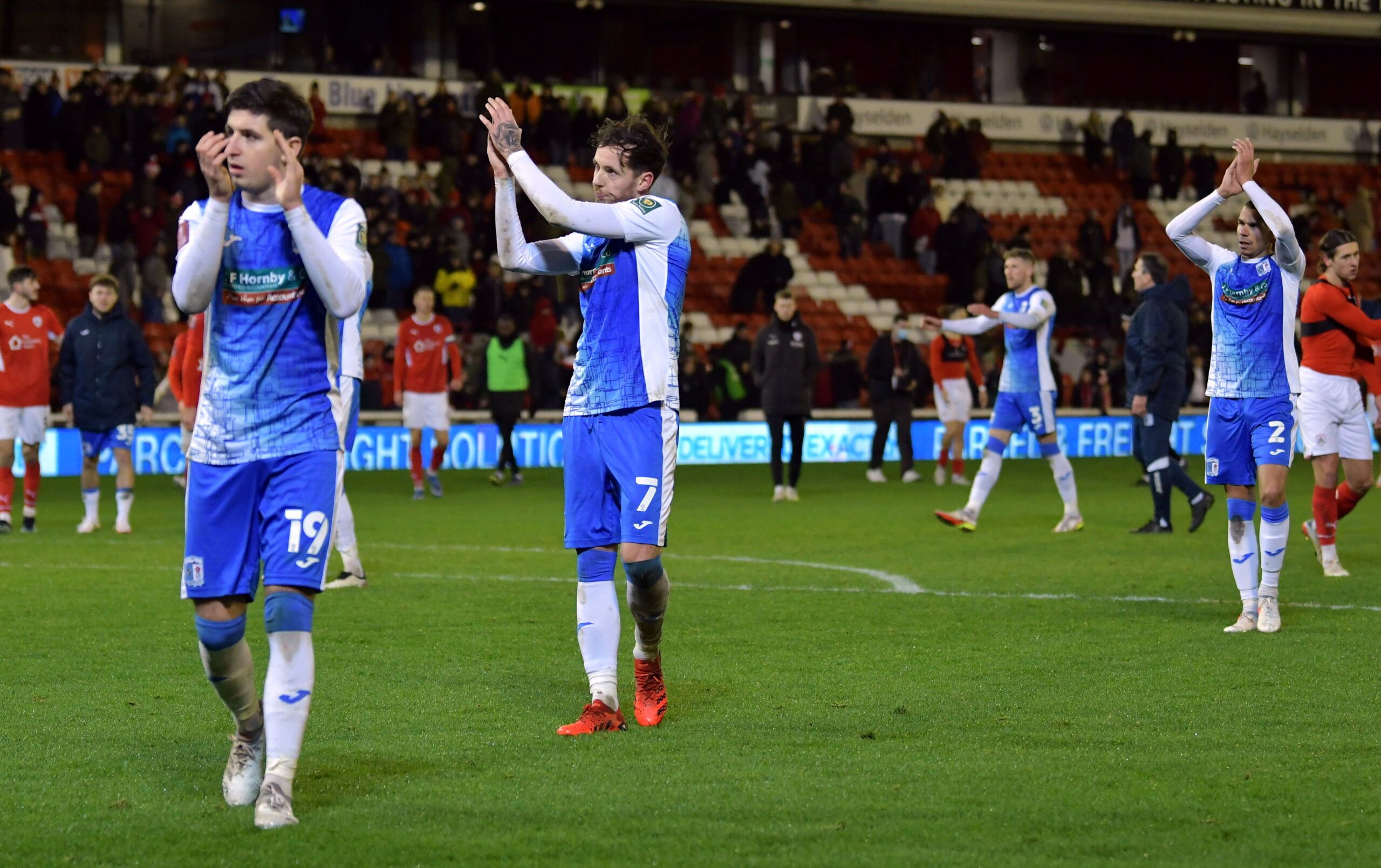 Soccer Football - FA Cup Third Round - Barnsley v Barrow - Oakwell, Barnsley, Britain - January 8, 2022 Barrow players applaud their fans after the match  Action Images/Paul Burrows