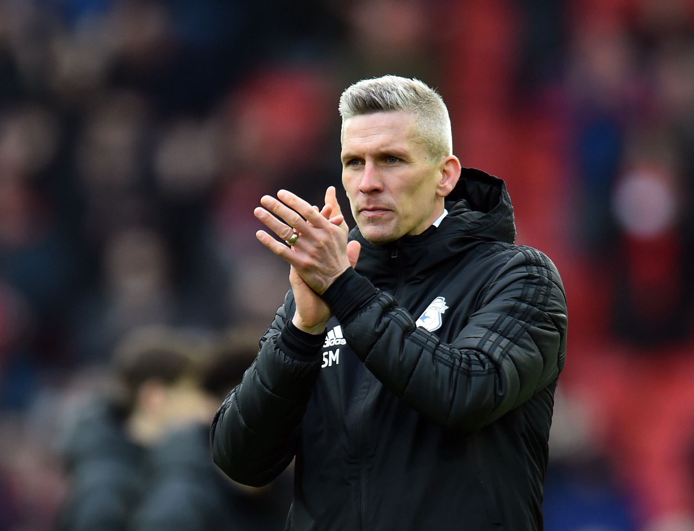 Soccer Football -  FA Cup - Fourth Round - Liverpool v Cardiff City - Anfield, Liverpool, Britain - February 6, 2022 Cardiff City manager Steve Morison applauds fans after the match REUTERS/Peter Powell