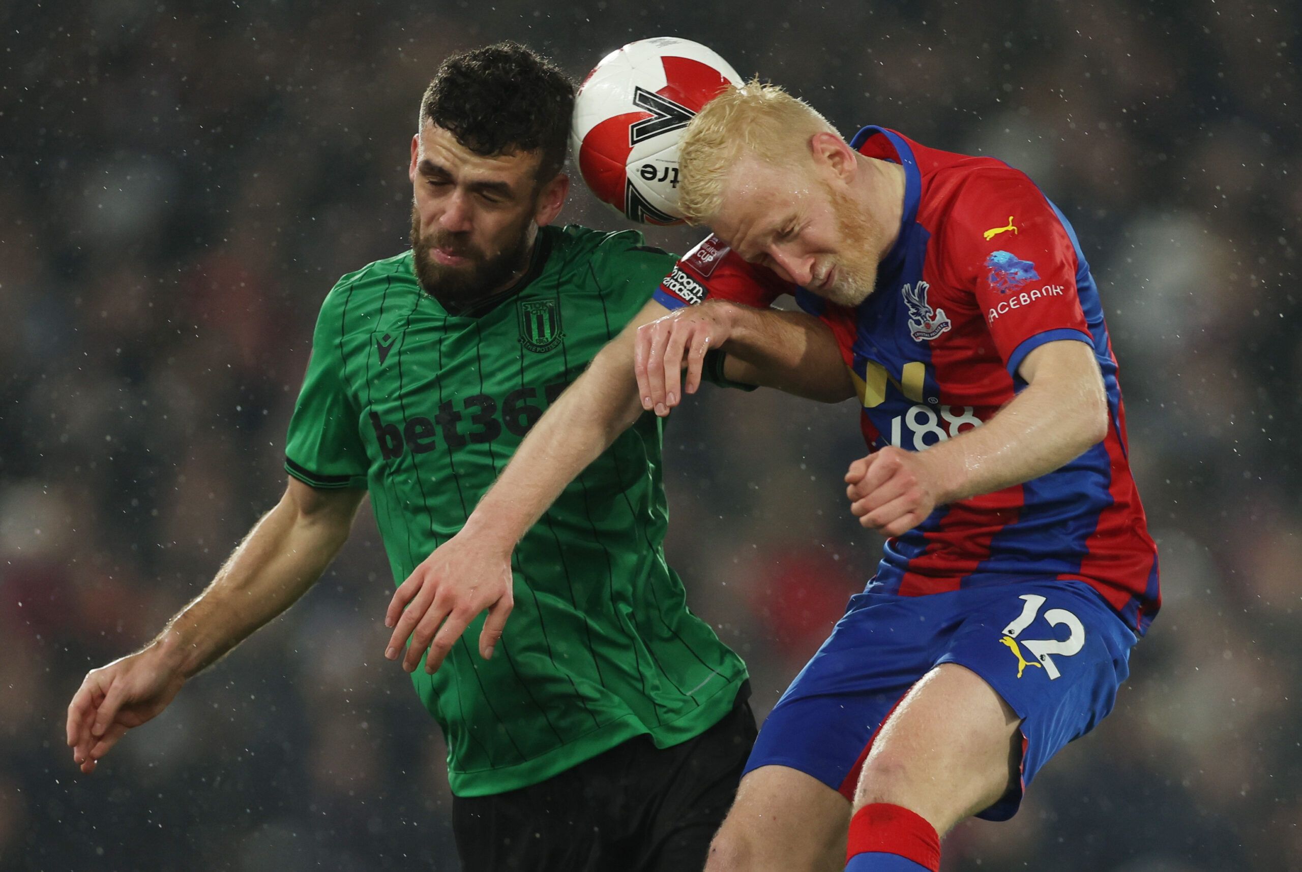 Soccer Football - FA Cup Fifth Round - Crystal Palace v Stoke City - Selhurst Park, London, Britain - March 1, 2022 Stoke City's Tommy Smith in action with Crystal Palace's Will Hughes Action Images via Reuters/Paul Childs