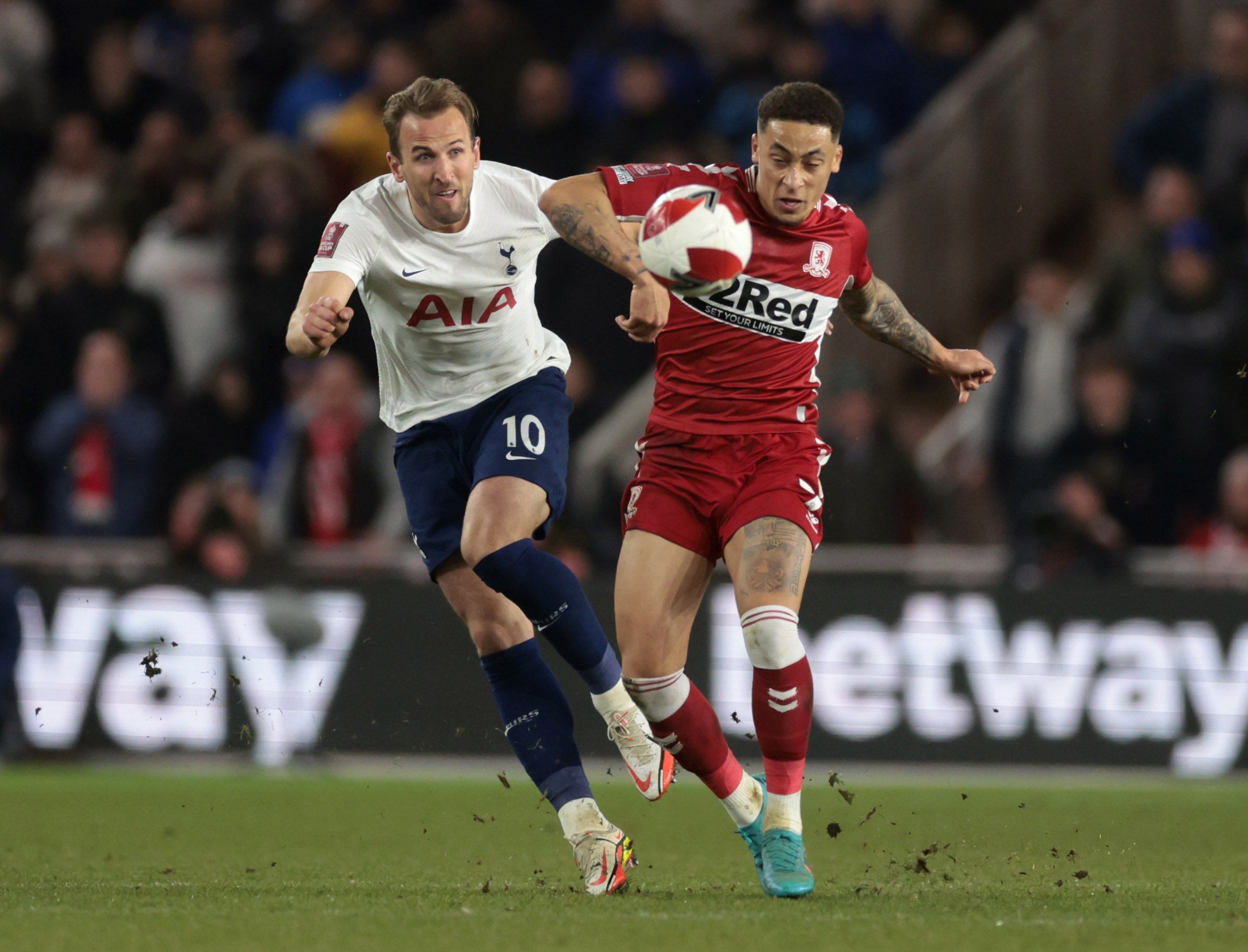 Soccer Football - FA Cup Fifth Round - Middlesbrough v Tottenham Hotspur - Riverside Stadium, Middlesbrough, Britain - March 1, 2022 Tottenham Hotspur's Harry Kane in action with Middlesbrough's Marcus Tavernier Action Images via Reuters/Lee Smith