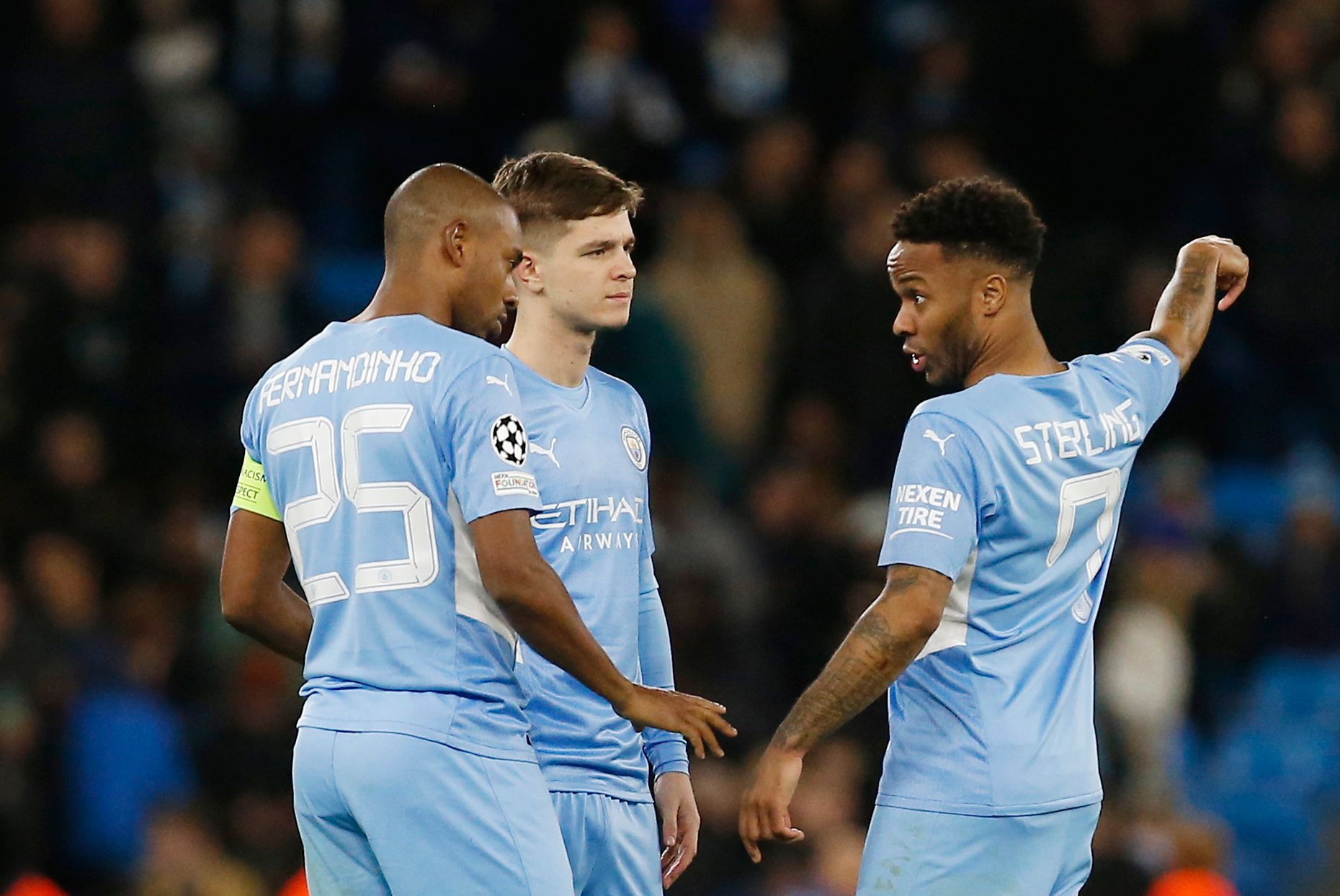 Soccer Football - Champions League - Round of 16 Second Leg - Manchester City v Sporting CP - Etihad Stadium, Manchester, Britain - March 9, 2022  Manchester City's Fernandinho, James Mcatee and Raheem Sterling before the start of the second half REUTERS/Craig Brough