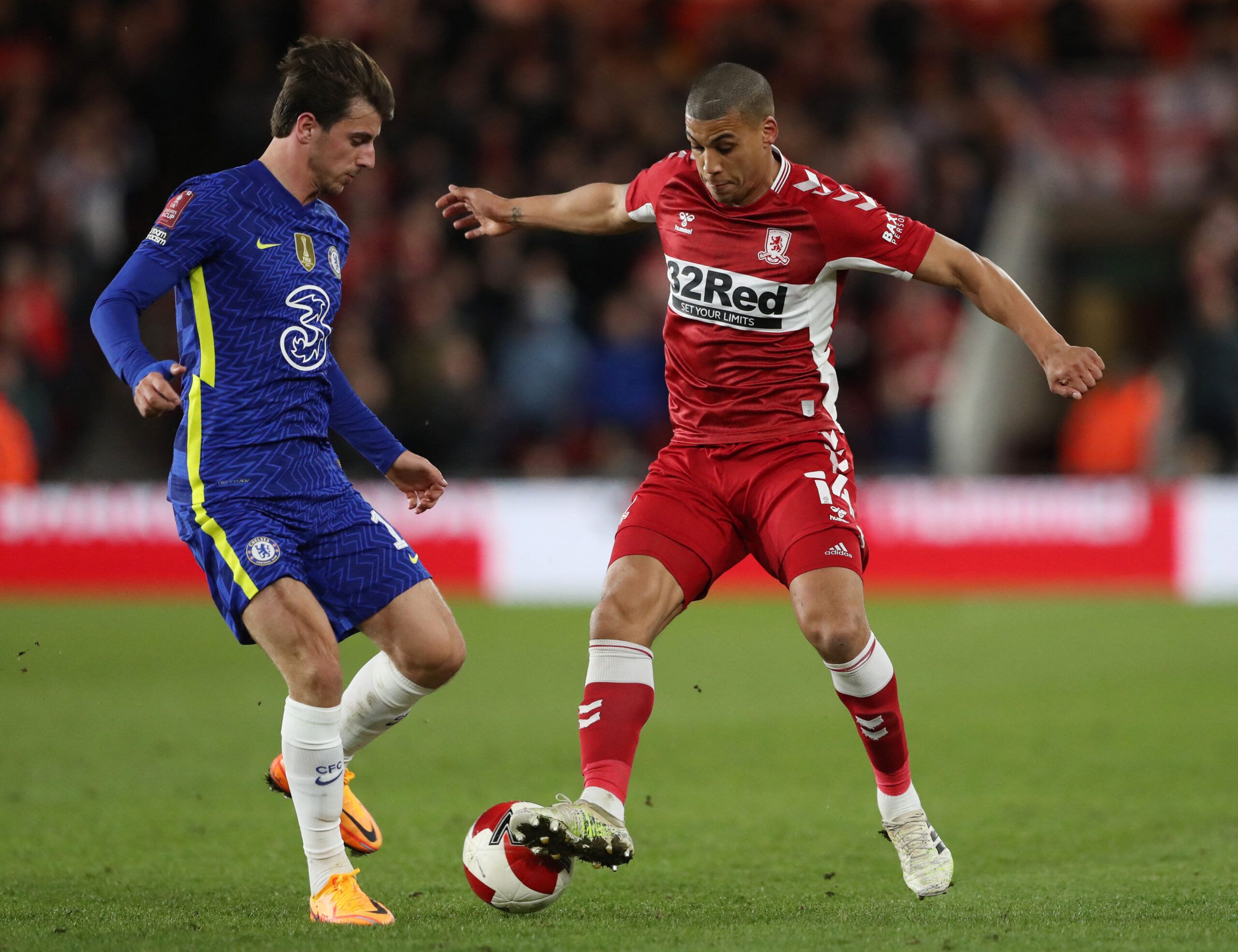 Soccer Football - FA Cup Quarter Final - Middlesbrough v Chelsea - Riverside Stadium, Middlesbrough, Britain - March 19, 2022 Middlesbrough's Lee Peltier in action with Chelsea's Mason Mount REUTERS/Scott Heppell