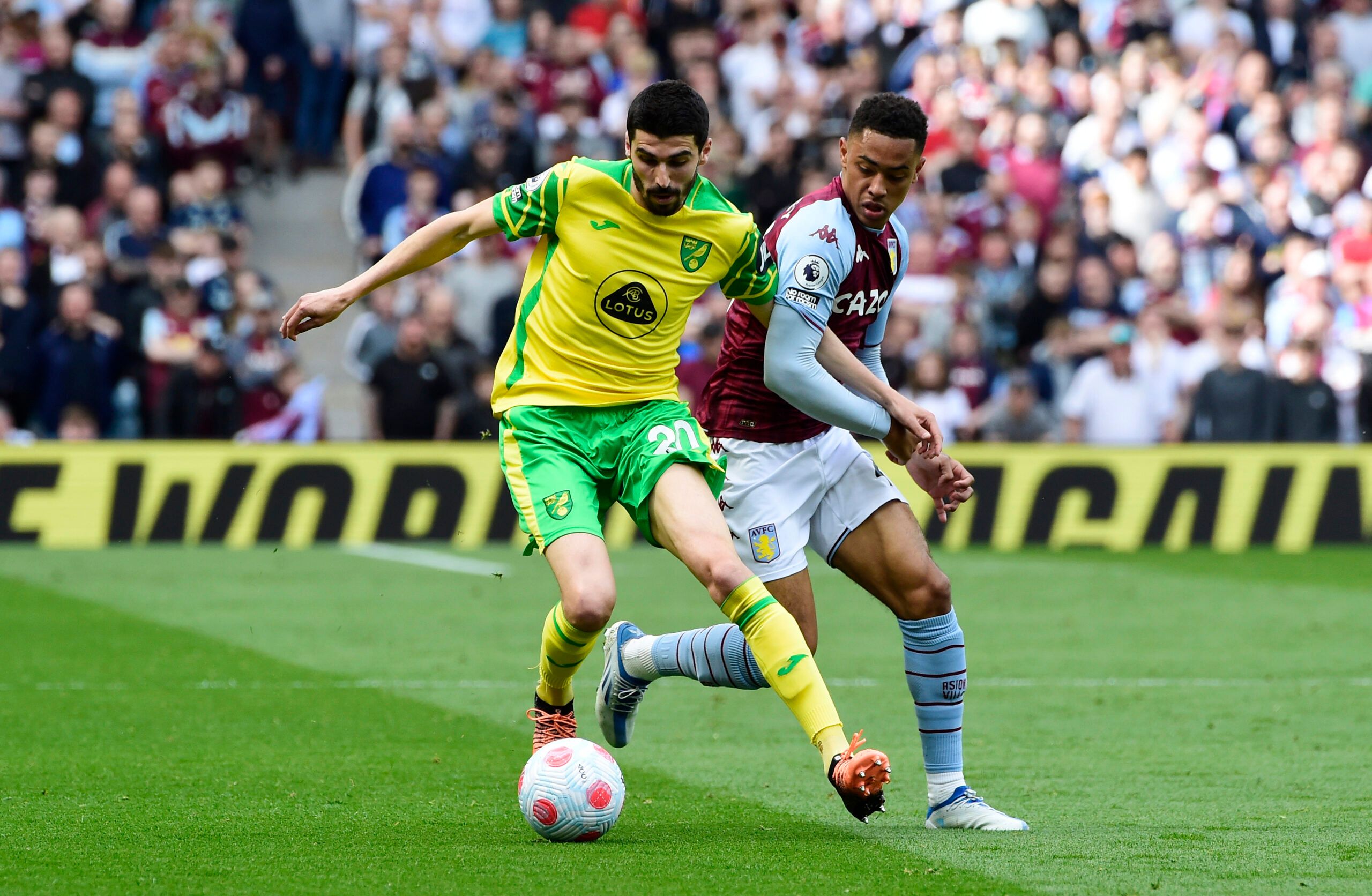 Soccer Football - Premier League - Aston Villa v Norwich City - Villa Park, Birmingham, Britain - April 30, 2022 Norwich City's Pierre Lees-Melou in action with Aston Villa's Jacob Ramsey REUTERS/Rebecca Naden EDITORIAL USE ONLY. No use with unauthorized audio, video, data, fixture lists, club/league logos or 'live' services. Online in-match use limited to 75 images, no video emulation. No use in betting, games or single club /league/player publications.  Please contact your account representati