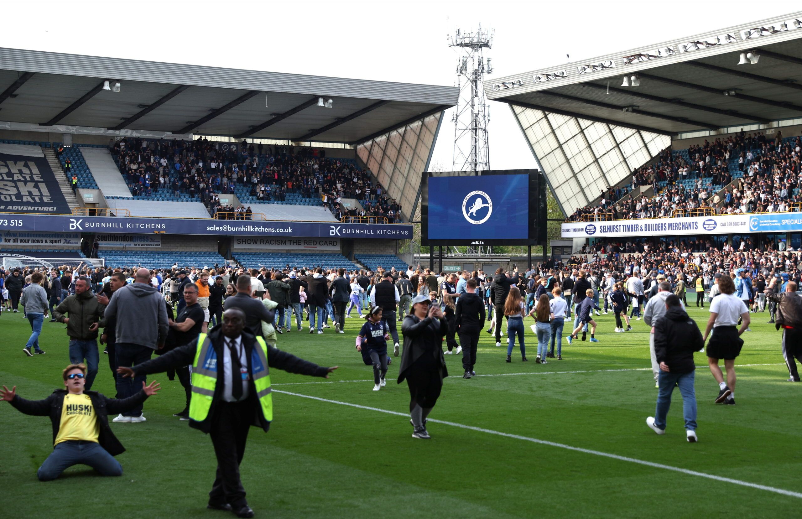 Soccer Football - Championship - Millwall v Peterborough United - The Den, London, Britain - April 30, 2022 Millwall fans run on the pitch after the match     Action Images/Paul Childs  EDITORIAL USE ONLY. No use with unauthorized audio, video, data, fixture lists, club/league logos or 