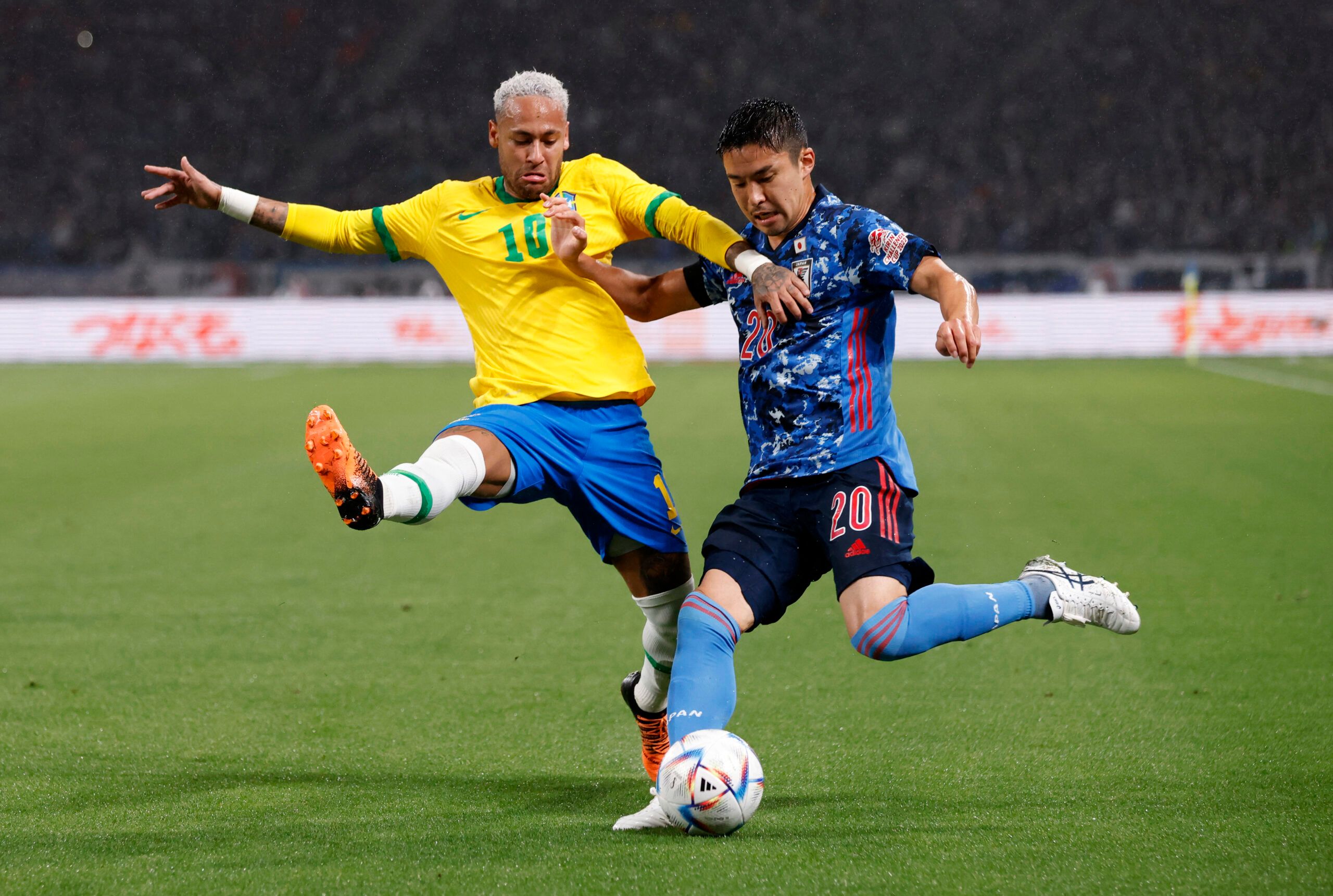 Soccer Football - International friendly - Japan v Brazil - Japan National Stadium, Tokyo, Japan - June 6, 2022 Brazil's Neymar in action with Japan's Yuta Nakayama REUTERS/Issei Kato