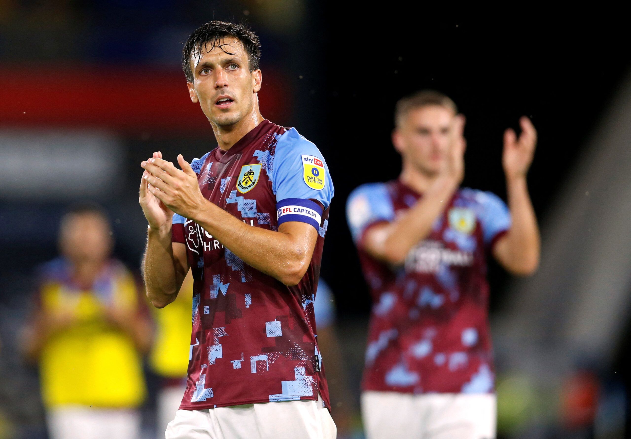 Soccer Football - Championship - Huddersfield Town v Burnley - John Smith's Stadium, Huddersfield, Britain - July 29, 2022 Burnley's Jack Cork applauds the fans after the match  Action Images/Ed Sykes  EDITORIAL USE ONLY. No use with unauthorized audio, video, data, fixture lists, club/league logos or 