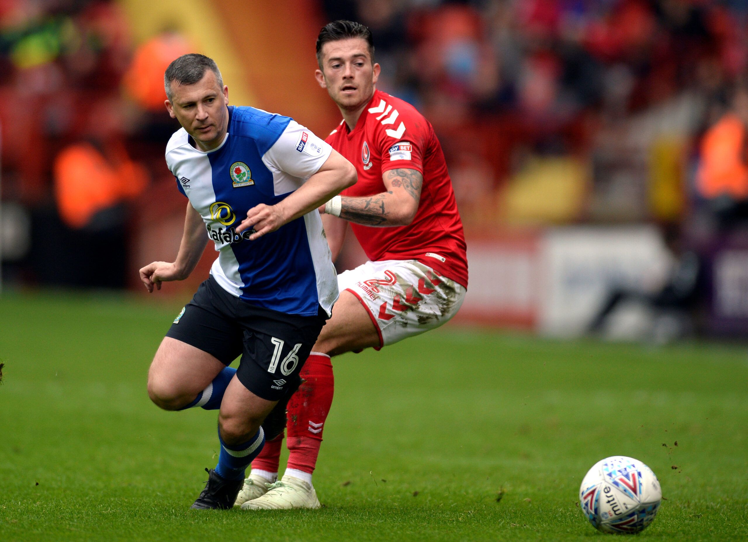 Soccer Football - Championship - Charlton Athletic v Blackburn Rovers - The Valley, London, Britain - April 28, 2018  Charlton Athletic's Lewis Page in action with Blackburn Rovers' Paul Caddis  Action Images/Adam Holt  EDITORIAL USE ONLY. No use with unauthorized audio, video, data, fixture lists, club/league logos or 