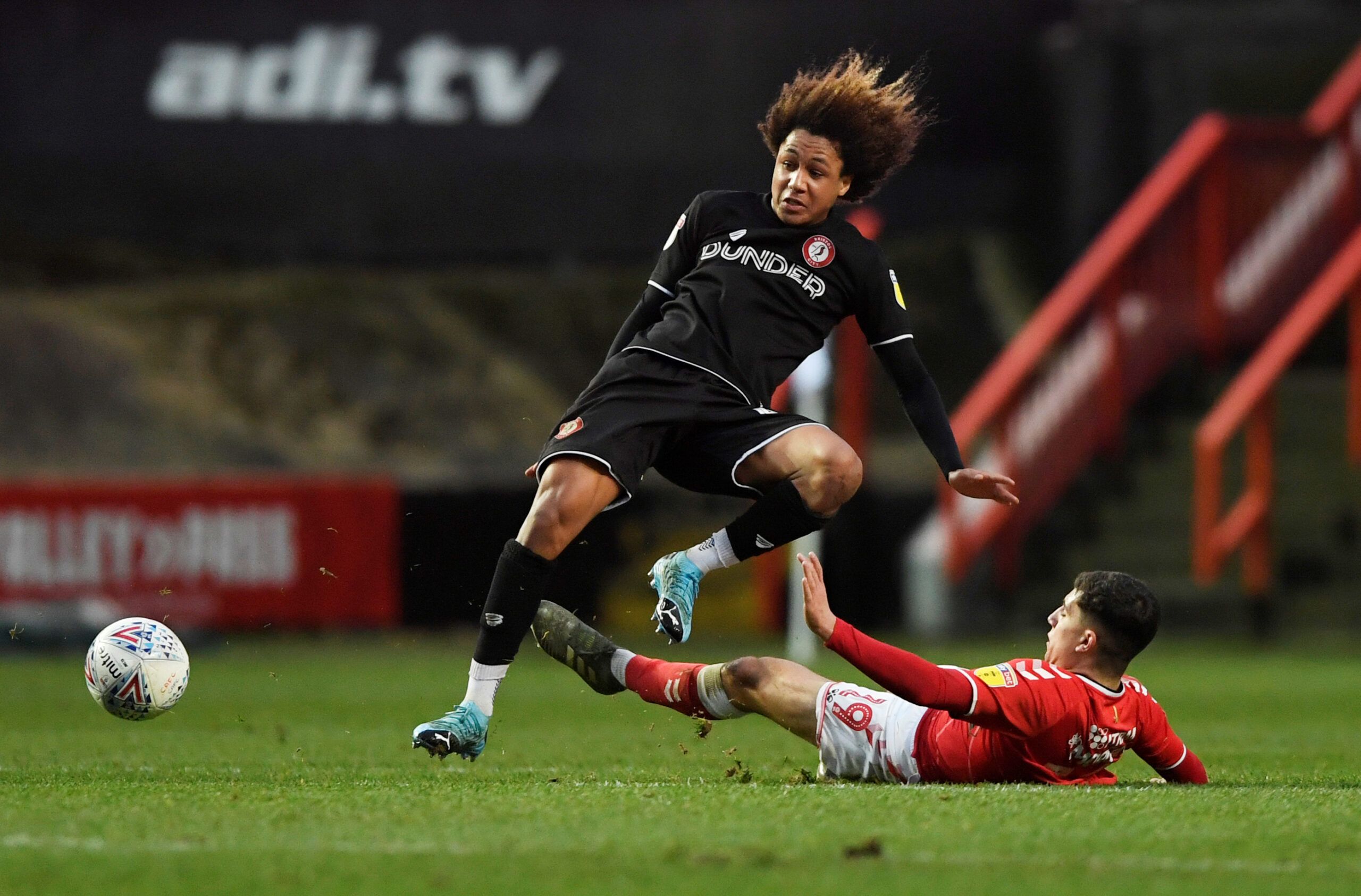 Soccer Football - Championship - Charlton Athletic v Bristol City - The Valley, London, Britain - December 26, 2019  Charlton's Albie Morgan in action with Bristol City's Han Noah Massengo  Action Images/Tony O'Brien  EDITORIAL USE ONLY. No use with unauthorized audio, video, data, fixture lists, club/league logos or 