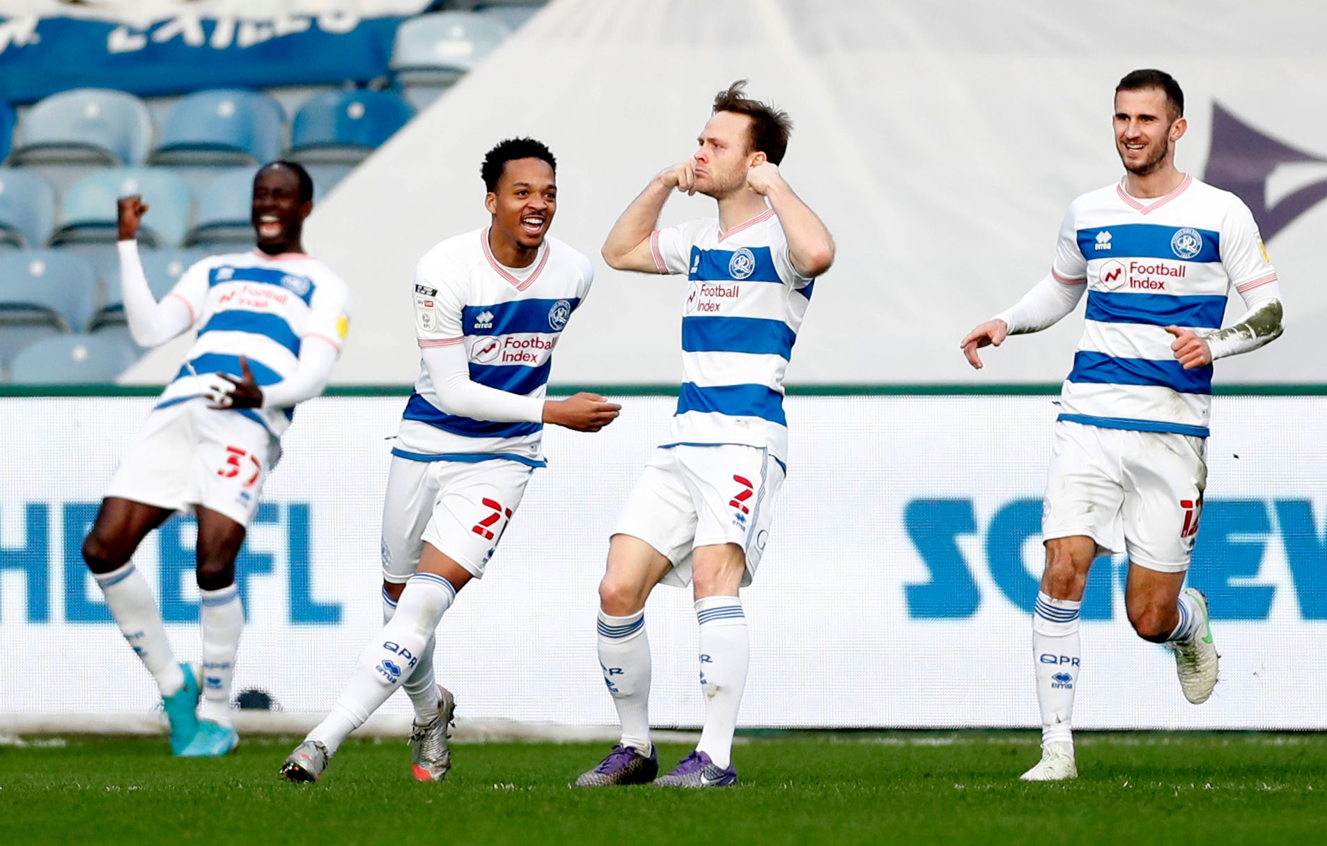 Soccer Football - Championship - Queens Park Rangers v AFC Bournemouth - Loftus Road, London, Britain - February 20, 2021 Queens Park Rangers' Todd Kane celebrates scoring their second goal with teammates Action Images/Matthew Childs EDITORIAL USE ONLY. No use with unauthorized audio, video, data, fixture lists, club/league logos or 'live' services. Online in-match use limited to 75 images, no video emulation. No use in betting, games or single club /league/player publications.  Please contact y