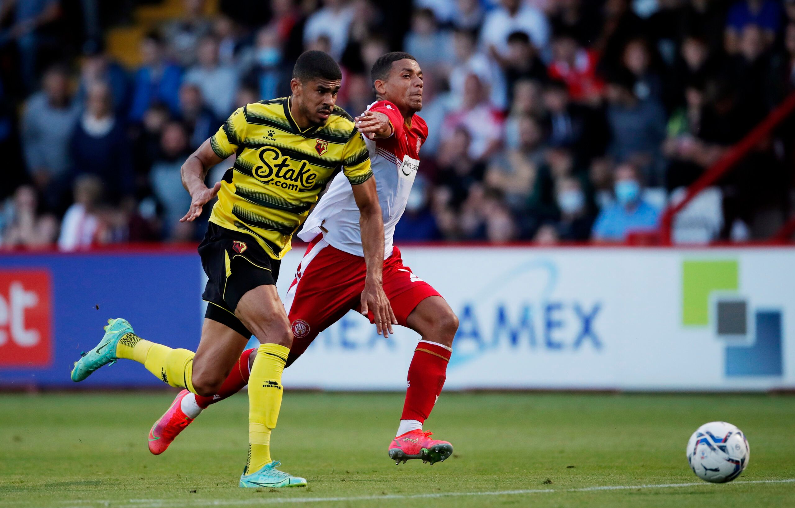 Soccer Football - Pre Season Friendly - Stevenage v Watford - The Lamex Stadium, Stevenage, Britain - July 27, 2021  Watford's Ashley Fletcher in action with Stevenage's Luther James-Wildin Action Images via Reuters/Andrew Couldridge
