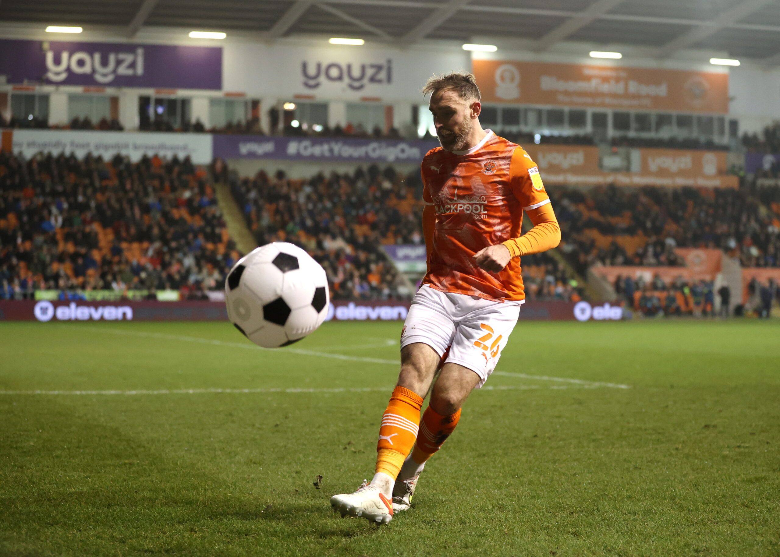 Soccer Football - Championship - Blackpool v Middlesbrough - Bloomfield Road, Blackpool, Britain - December 29, 2021 Blackpool's Richard Keogh kicks an inflatable ball into the crowd    Action Images/Molly Darlington  EDITORIAL USE ONLY. No use with unauthorized audio, video, data, fixture lists, club/league logos or 