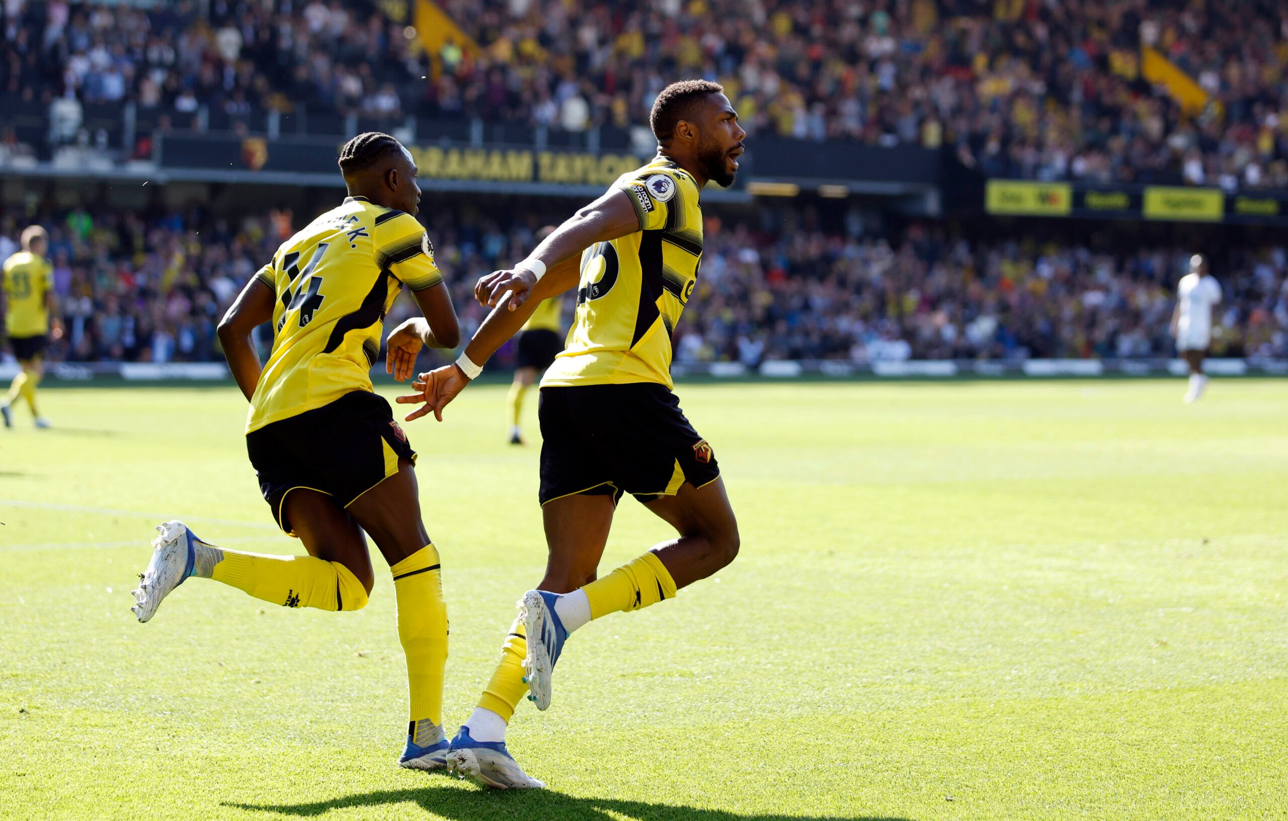 Soccer Football - Premier League - Watford v Brentford - Vicarage Road, Watford, Britain - April 16, 2022 Watford's Emmanuel Dennis celebrates scoring their first goal Action Images via Reuters/Peter Cziborra EDITORIAL USE ONLY. No use with unauthorized audio, video, data, fixture lists, club/league logos or 'live' services. Online in-match use limited to 75 images, no video emulation. No use in betting, games or single club /league/player publications.  Please contact your account representativ