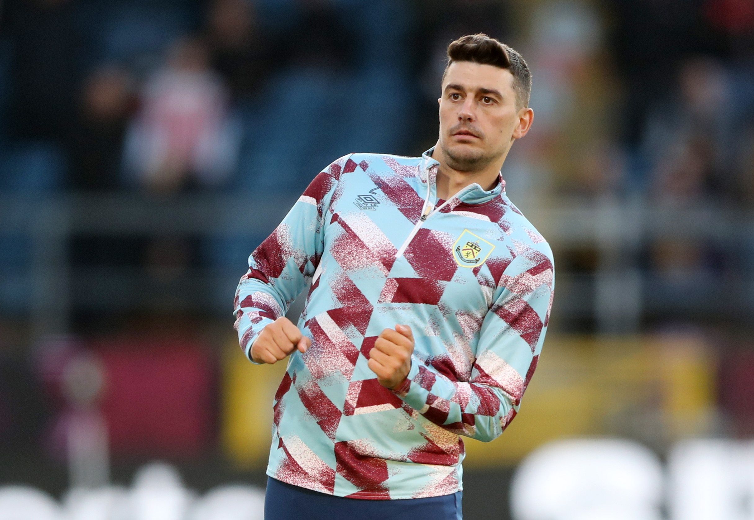 Soccer Football - Premier League - Burnley v Southampton - Turf Moor, Burnley, Britain - April 21, 2022 Burnley's Matthew Lowton during the warm up before the match Action Images via Reuters/Molly Darlington EDITORIAL USE ONLY. No use with unauthorized audio, video, data, fixture lists, club/league logos or 'live' services. Online in-match use limited to 75 images, no video emulation. No use in betting, games or single club /league/player publications.  Please contact your account representative