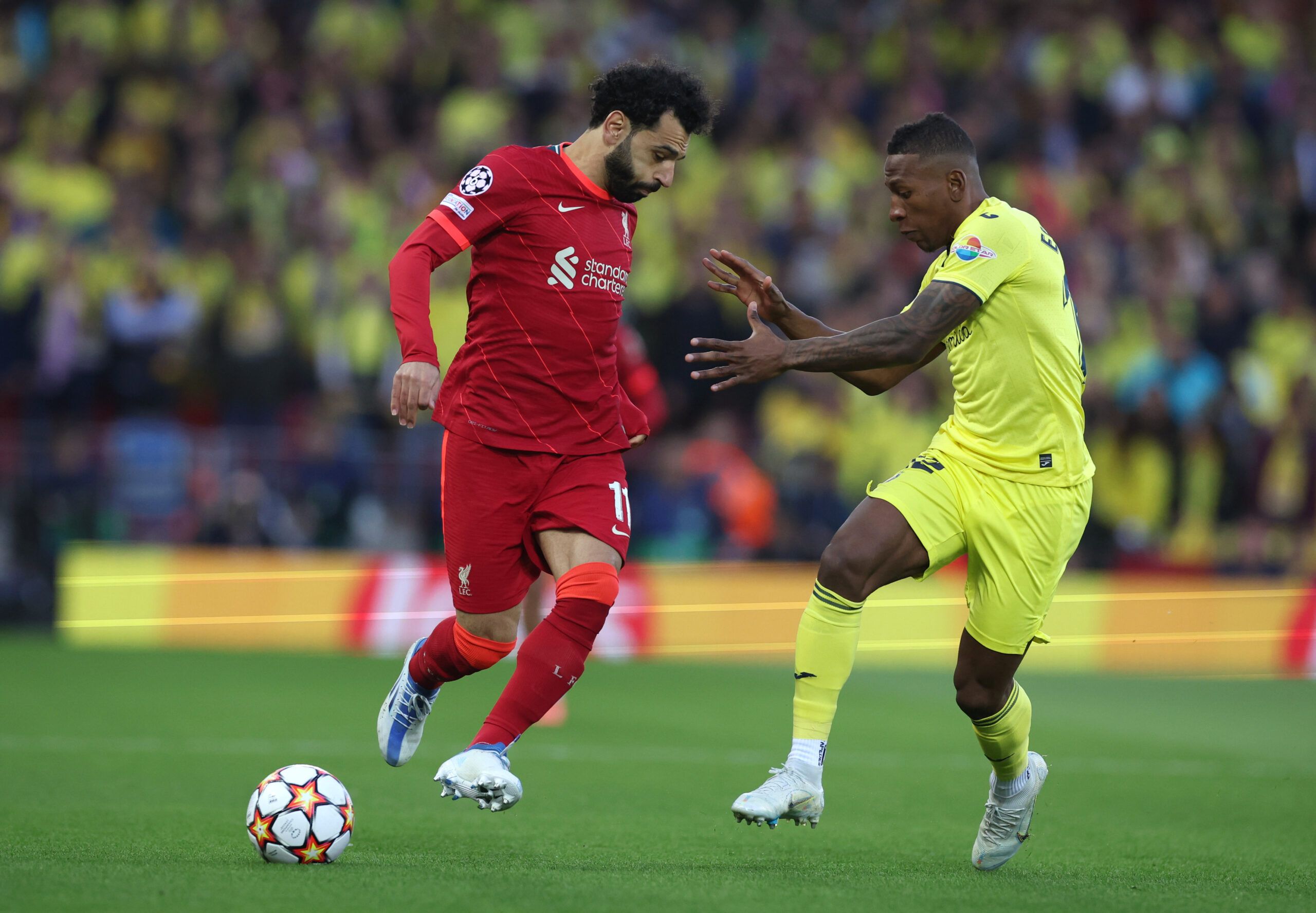 Soccer Football - Champions League - Semi Final - First Leg - Liverpool v Villarreal - Anfield, Liverpool, Britain - April 27, 2022 Liverpool's Mohamed Salah in action with Villarreal's Pervis Estupinan REUTERS/Phil Noble