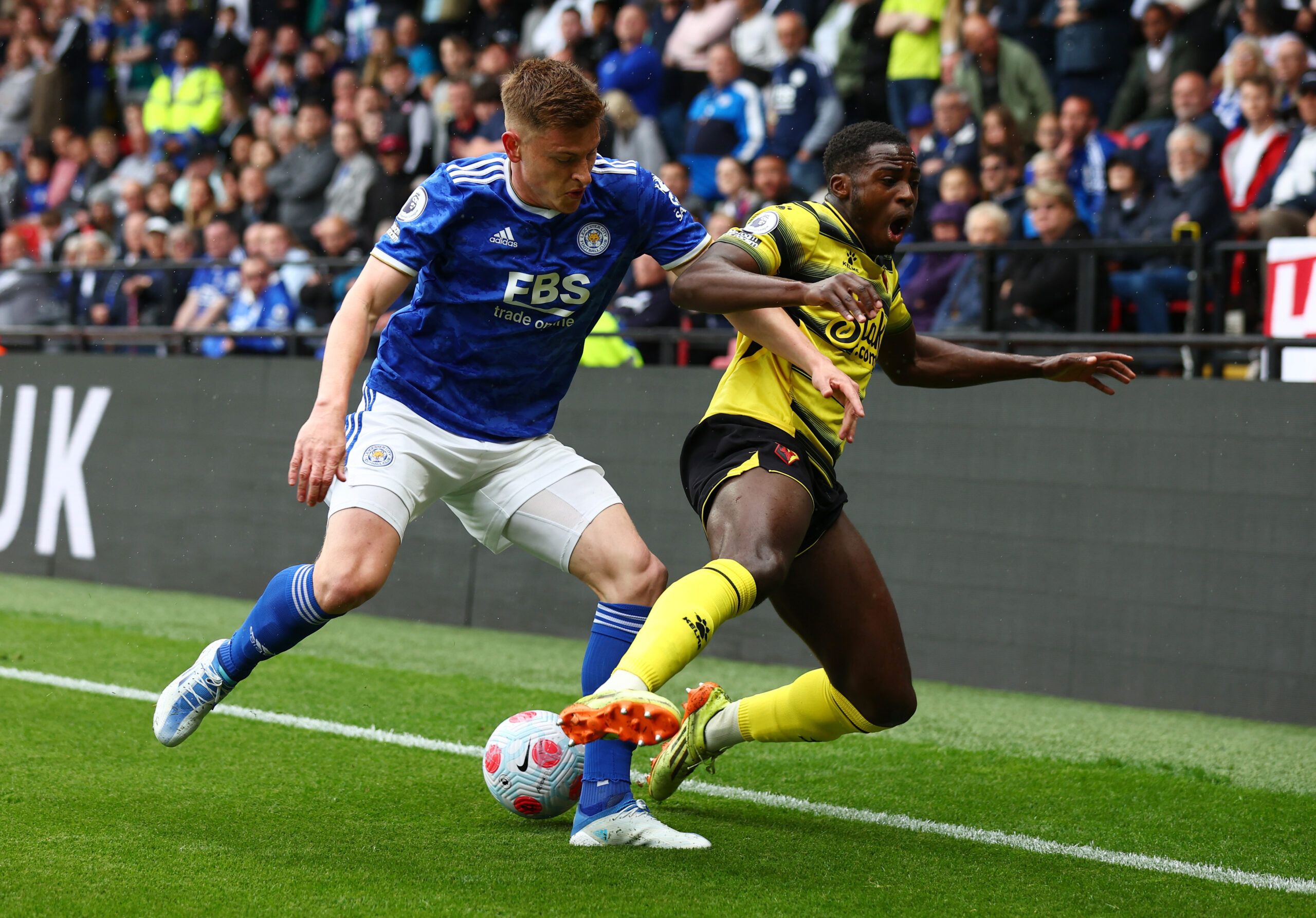 Soccer Football - Premier League - Watford v Leicester City - Vicarage Road, Watford, Britain - May 15, 2022 Leicester City's Harvey Barnes in action with Watford's Jeremy Ngakia REUTERS/David Klein EDITORIAL USE ONLY. No use with unauthorized audio, video, data, fixture lists, club/league logos or 'live' services. Online in-match use limited to 75 images, no video emulation. No use in betting, games or single club /league/player publications.  Please contact your account representative for furt