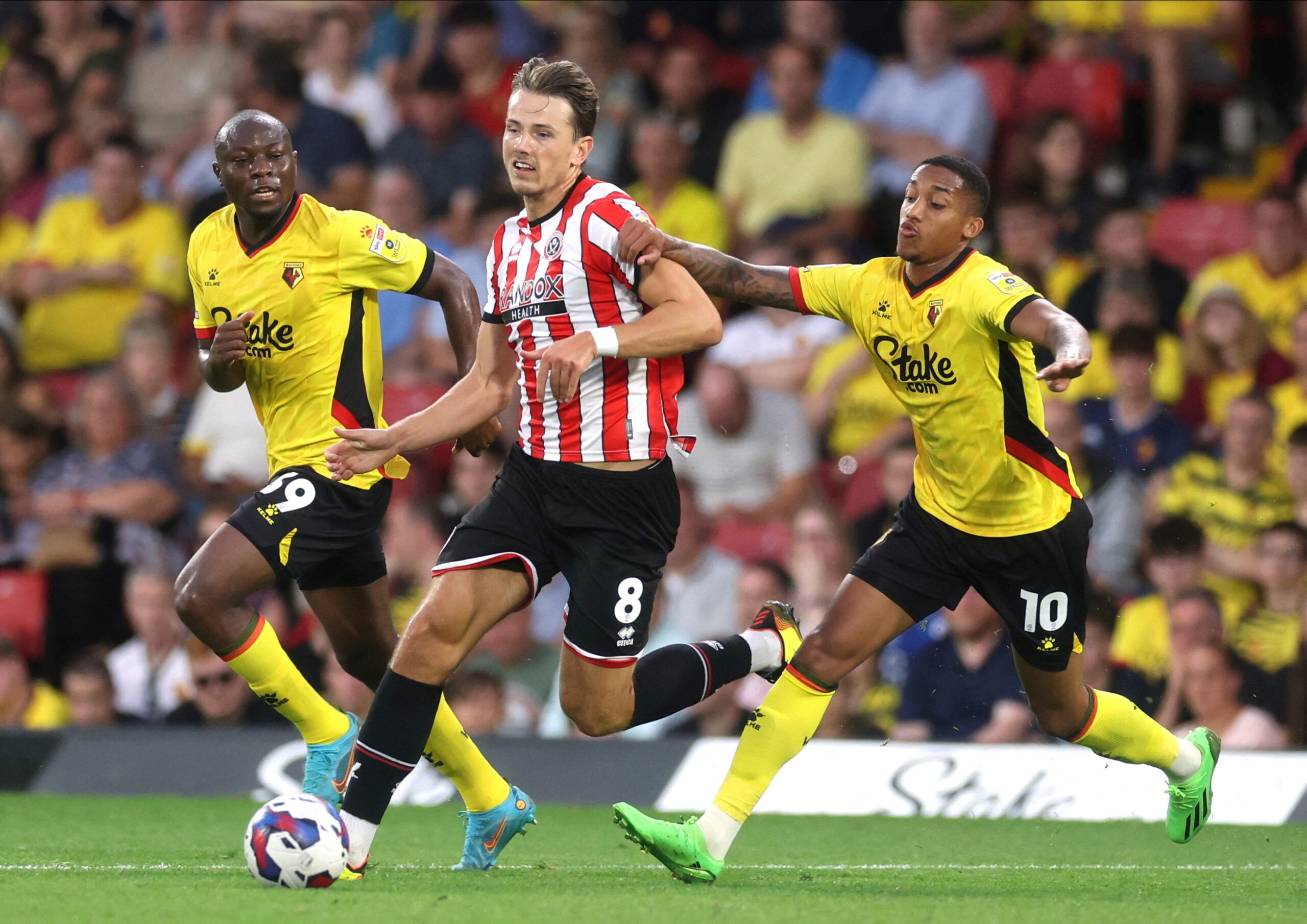 Soccer Football - Championship - Watford v Sheffield United - Vicarage Road, Watford, Britain - August 1, 2022 Watford's Joao Pedro in action with Sheffield United's Sander Berge  Action Images/Paul Childs  EDITORIAL USE ONLY. No use with unauthorized audio, video, data, fixture lists, club/league logos or 