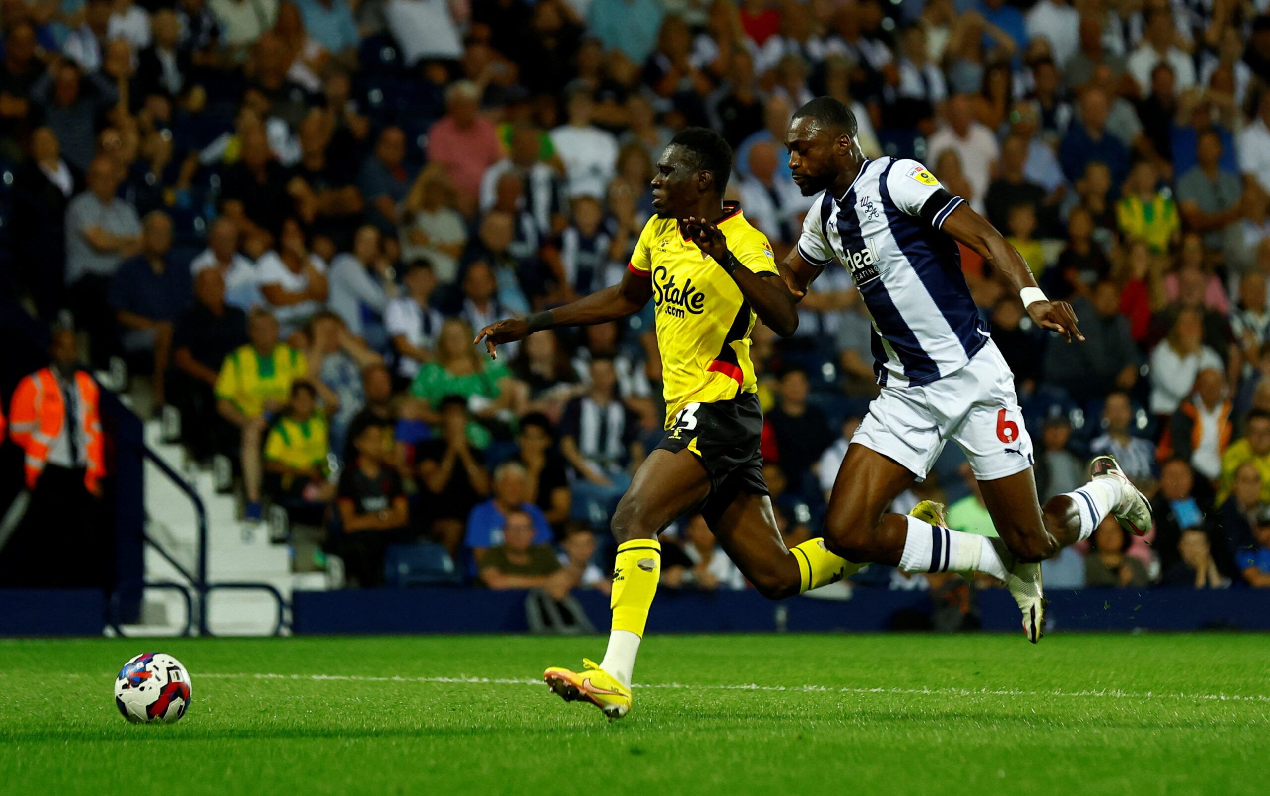 Soccer Football - Championship - West Bromwich Albion v Watford - The Hawthorns, West Bromwich, Britain - August 8, 2022 Watford's Ismaila Sarr is fouled by West Bromwich Albion's Semi Ajayi and a penalty is awarded Action Images/Andrew Boyers  EDITORIAL USE ONLY. No use with unauthorized audio, video, data, fixture lists, club/league logos or 