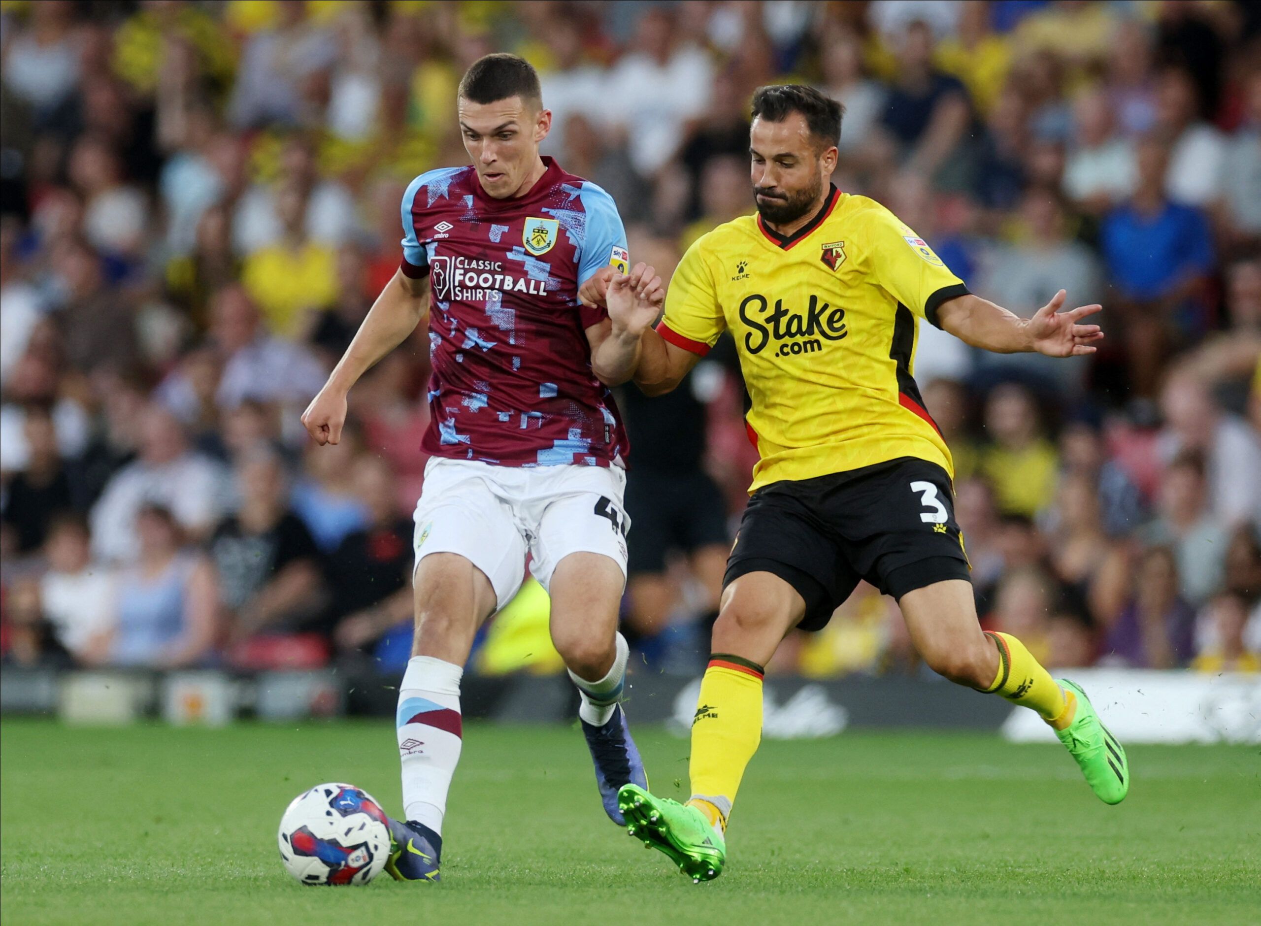 Soccer Football - Championship - Watford v Burnley - Vicarage Road, Watford, Britain - August 12, 2022 Watford's Mario Gaspar in action with Burnley's Dara Costelloe EDITORIAL USE ONLY. No use with unauthorized audio, video, data, fixture lists, club/league logos or 