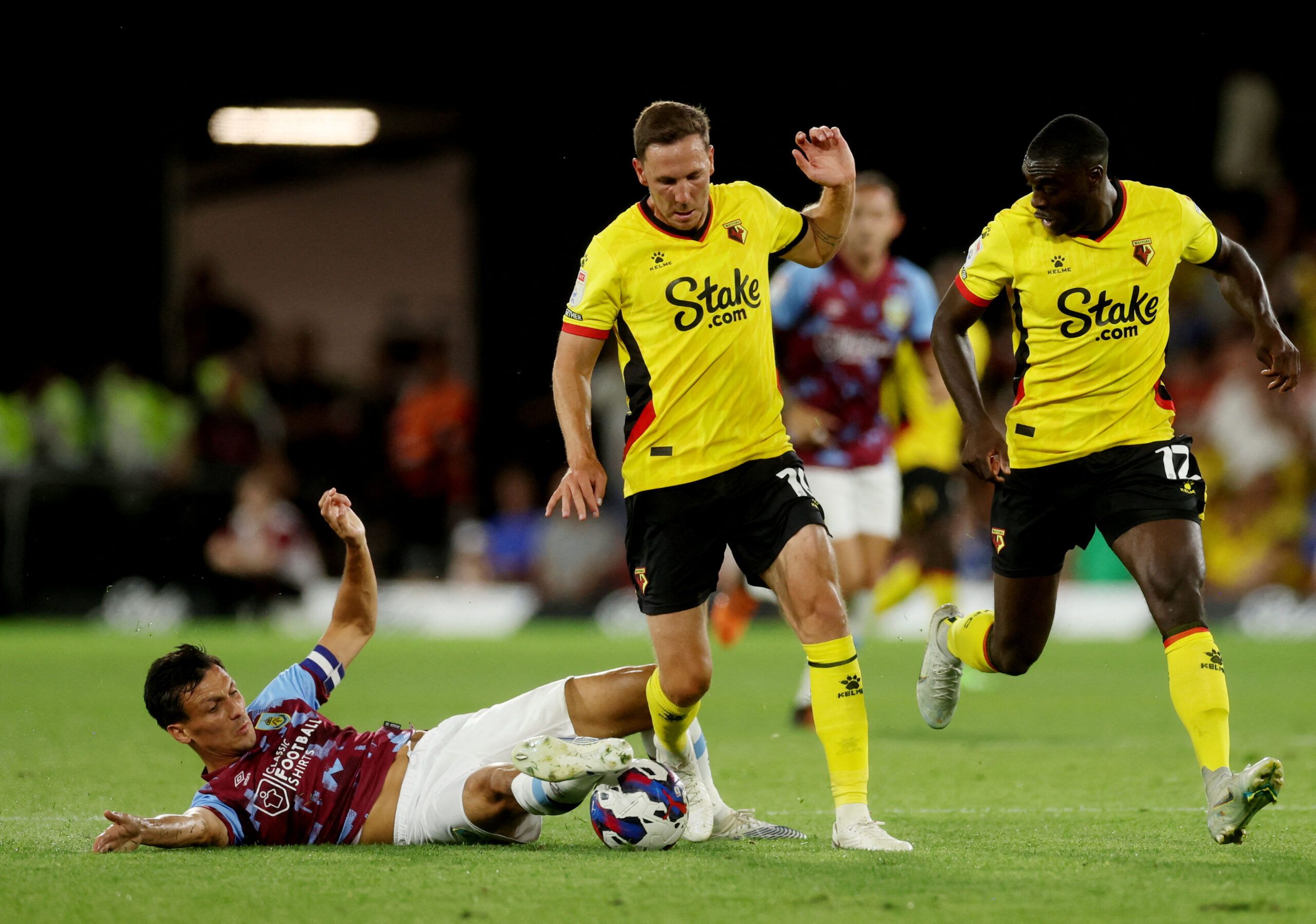 Soccer Football - Championship - Watford v Burnley - Vicarage Road, Watford, Britain - August 12, 2022 Watford's Dan Gosling in action with Burnley's Jack Cork Action Images/Paul Childs  EDITORIAL USE ONLY. No use with unauthorized audio, video, data, fixture lists, club/league logos or 