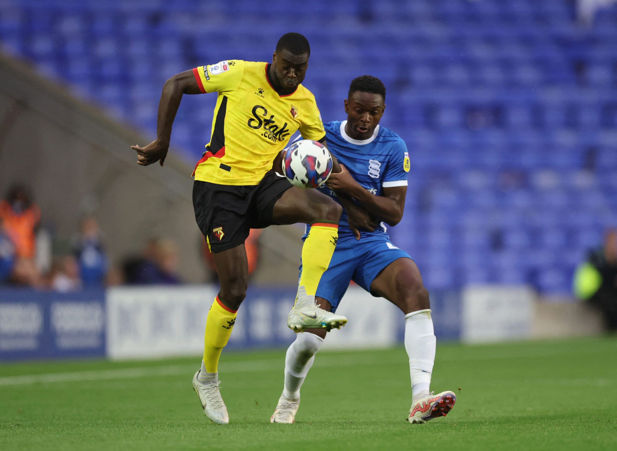 Soccer Football - Birmingham City v Watford - St Andrew's, Birmingham, Britain - August 16, 2022 Watford's Ken Sema in action with Birmingham City's Josh Williams Action Images/Carl Recine EDITORIAL USE ONLY. No use with unauthorized audio, video, data, fixture lists, club/league logos or 'live' services. Online in-match use limited to 75 images, no video emulation. No use in betting, games or single club /league/player publications.  Please contact your account representative for further detail