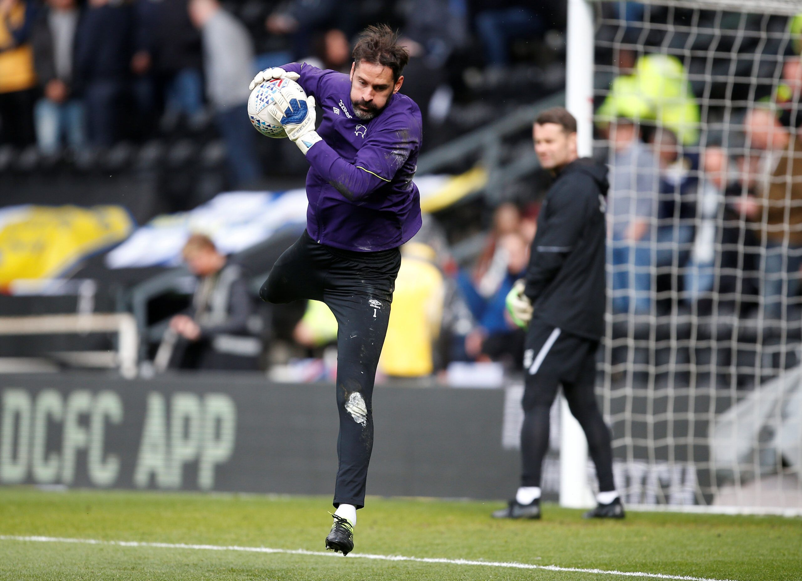 Soccer Football - Championship Play-Off Semi Final First Leg - Derby County v Leeds United - Pride Park, Derby, Britain - May 11, 2019   Derby County's Scott Carson during the warm up before the match      Action Images via Reuters/Craig Brough    EDITORIAL USE ONLY. No use with unauthorized audio, video, data, fixture lists, club/league logos or 