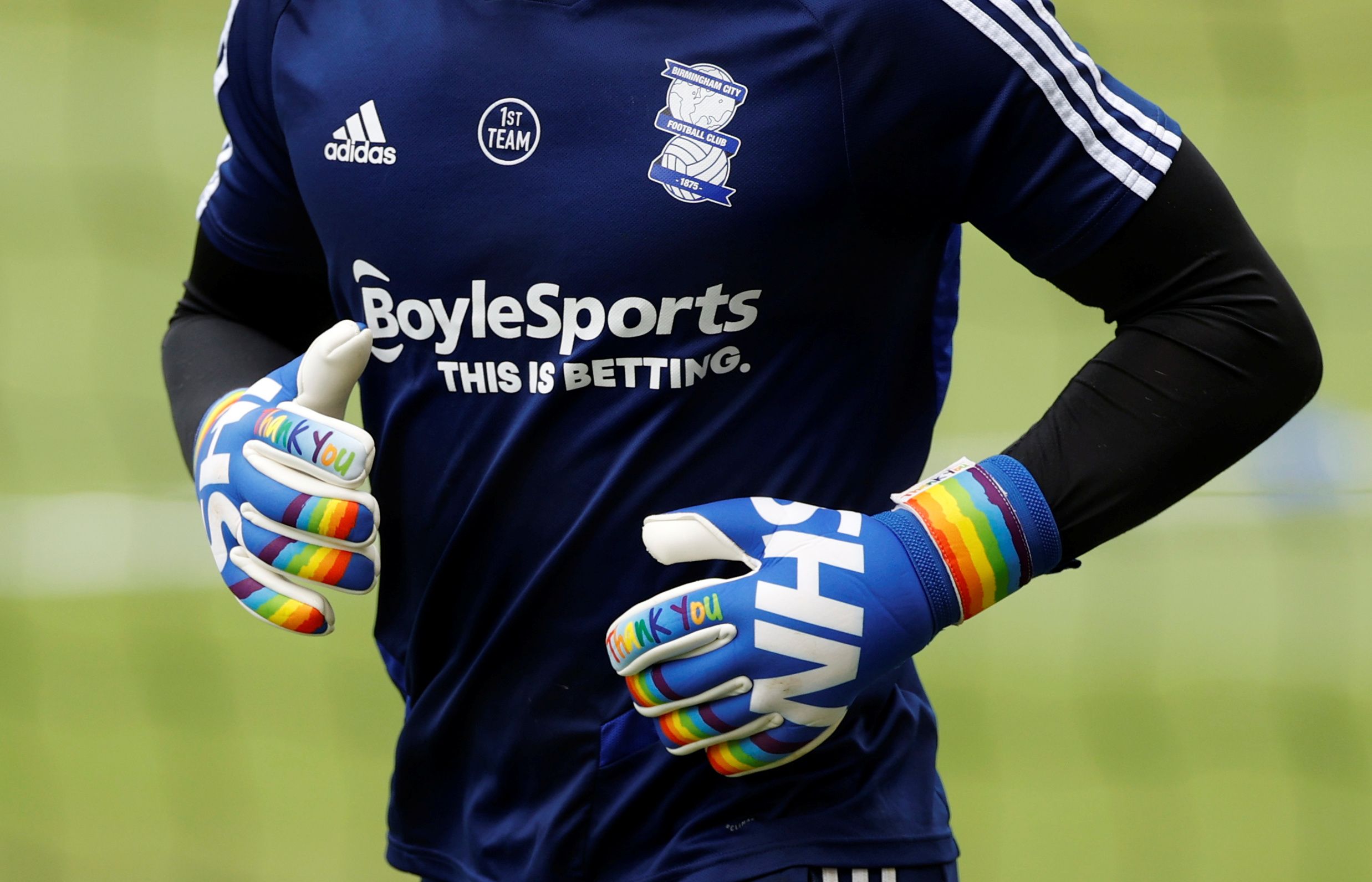 Soccer Football - Championship - Fulham v Birmingham City - Craven Cottage, London, Britain - July 4, 2020  NHS and rainbow tributes are seen on the gloves of Birmingham City's Connal Trueman during warm up, as play resumes behind closed doors following the outbreak of the coronavirus disease (COVID-19)  Action Images/John Sibley  EDITORIAL USE ONLY. No use with unauthorized audio, video, data, fixture lists, club/league logos or 