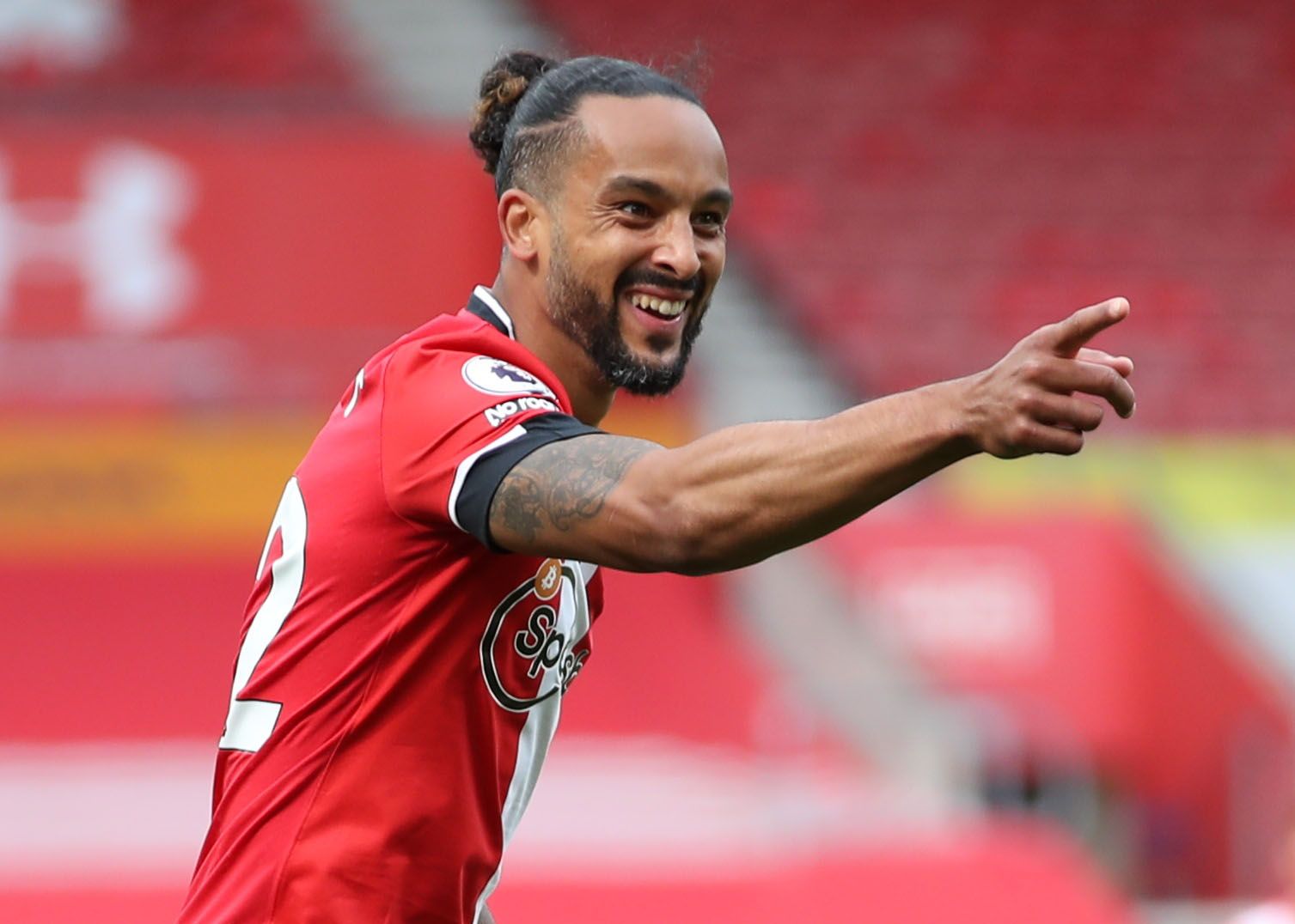 Soccer Football - Premier League - Southampton v Fulham - St Mary's Stadium, Southampton, Britain - May 15, 2021 Southampton's Theo Walcott celebrates scoring their third goal Pool via REUTERS/Peter Cziborra EDITORIAL USE ONLY. No use with unauthorized audio, video, data, fixture lists, club/league logos or 'live' services. Online in-match use limited to 75 images, no video emulation. No use in betting, games or single club /league/player publications.  Please contact your account representative