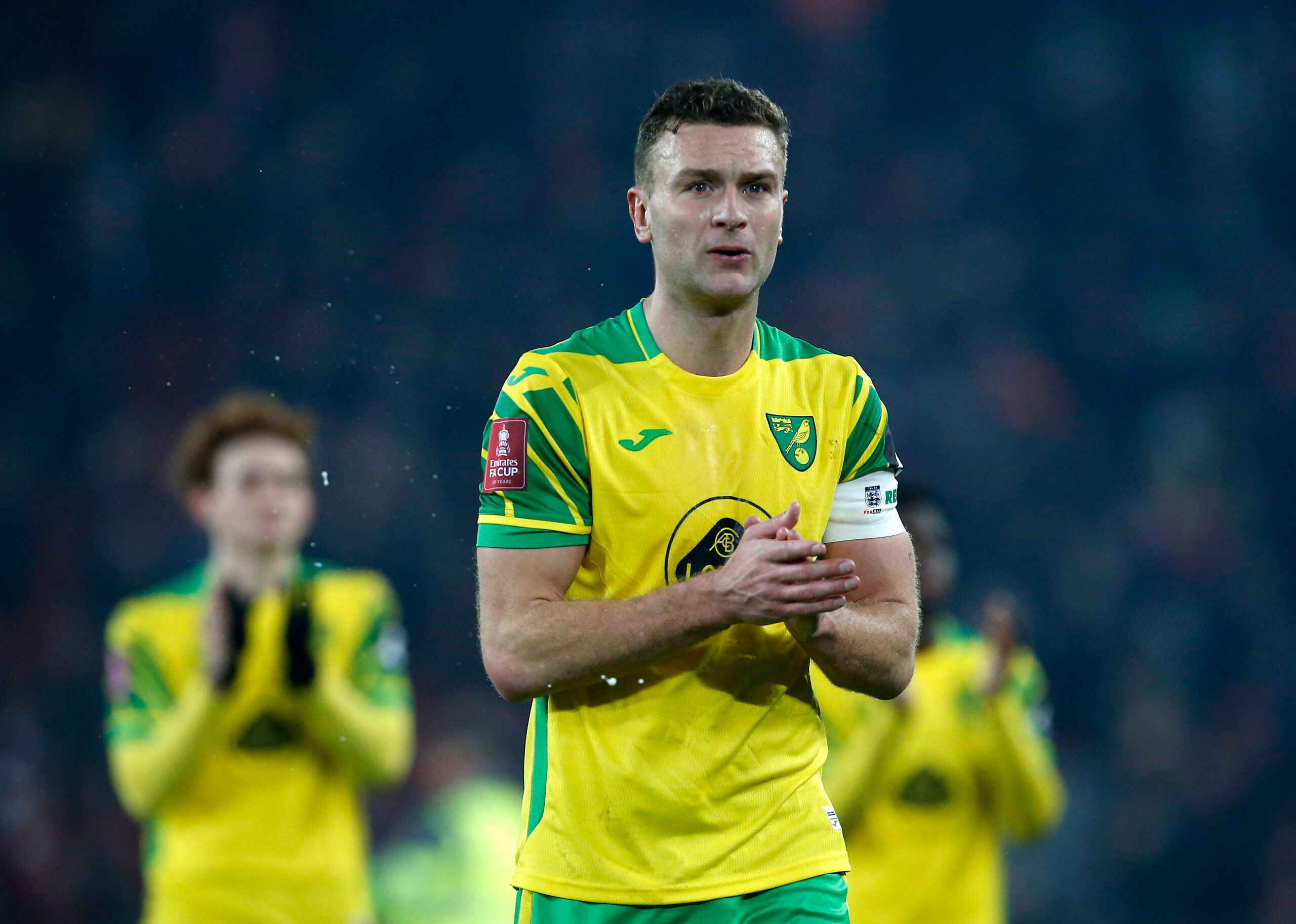 Soccer Football - FA Cup Fifth Round - Liverpool v Norwich City - Anfield, Liverpool, Britain - March 2, 2022 Norwich City's Ben Gibson applauds fans after the match REUTERS/Craig Brough