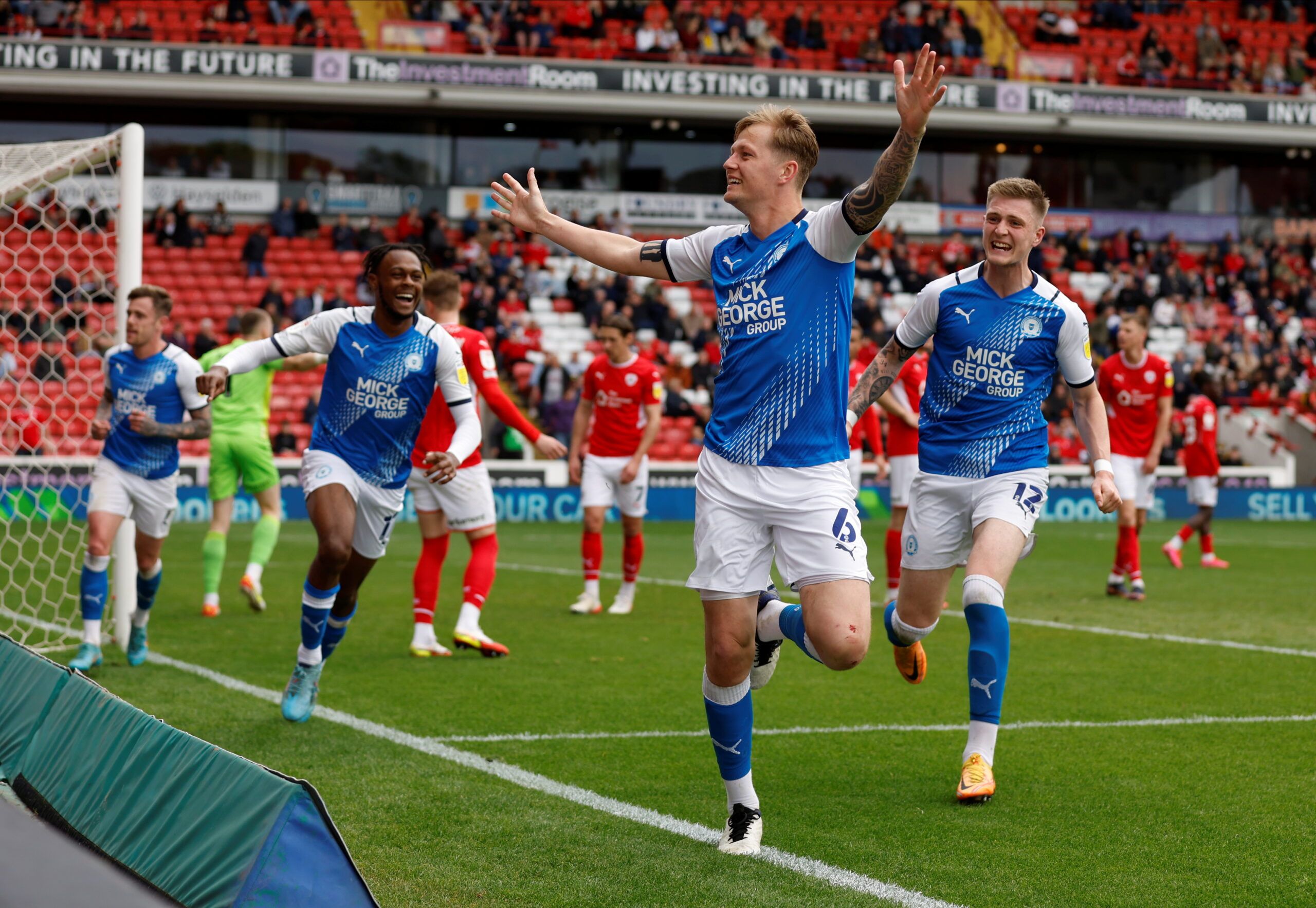 Soccer Football - Championship - Barnsley v Peterborough United - Oakwell, Barnsley, Britain - April 18, 2022 Peterborough United's Frankie Kent celebrates scoring their second goal  Action Images/Jason Cairnduff  EDITORIAL USE ONLY. No use with unauthorized audio, video, data, fixture lists, club/league logos or 
