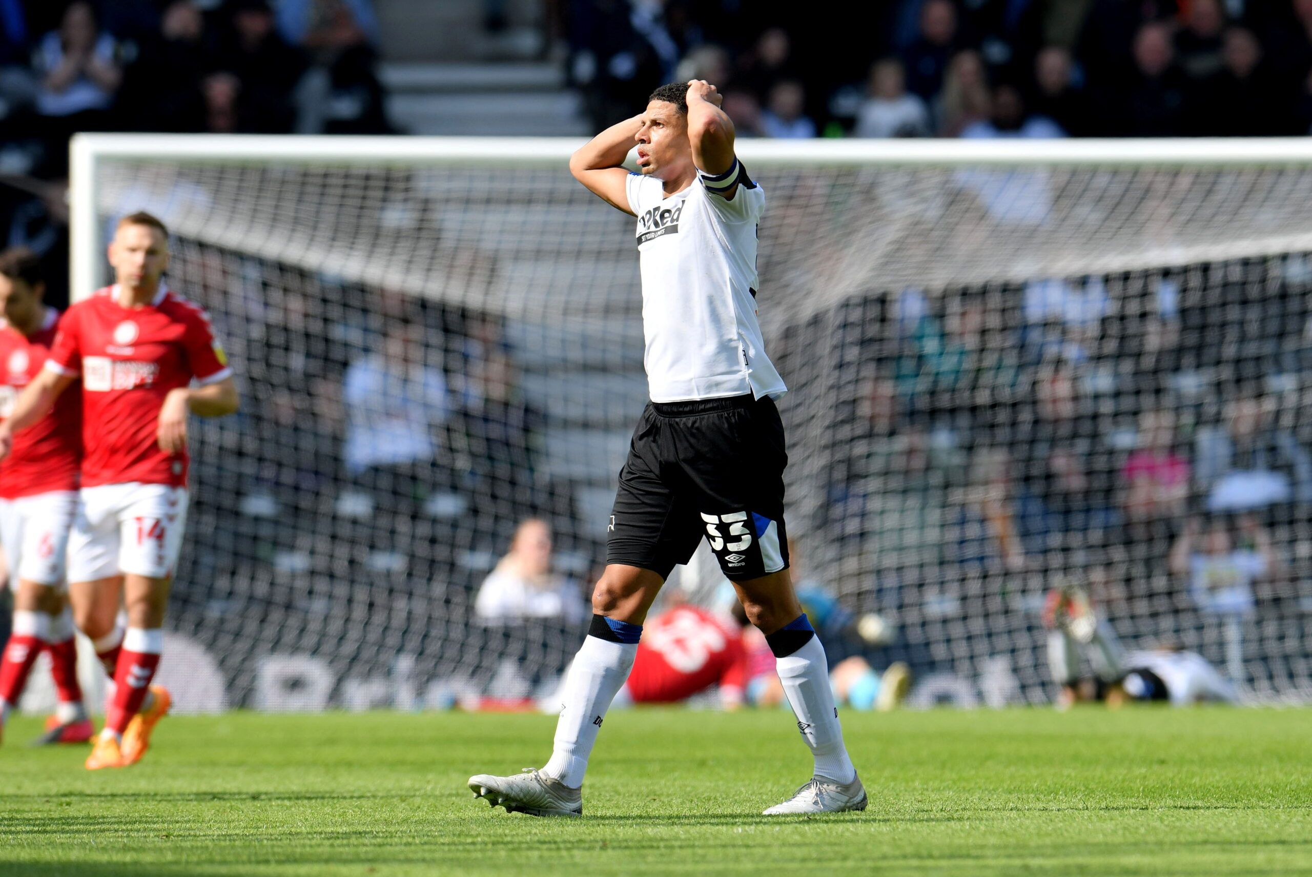 Soccer Football - Championship - Derby County v Bristol City - Pride Park, Derby, Britain - April 23, 2022 Derby County's Curtis Davies reacts to a missed chance by Bartosz Cybulski  Action Images/Paul Burrows  EDITORIAL USE ONLY. No use with unauthorized audio, video, data, fixture lists, club/league logos or 