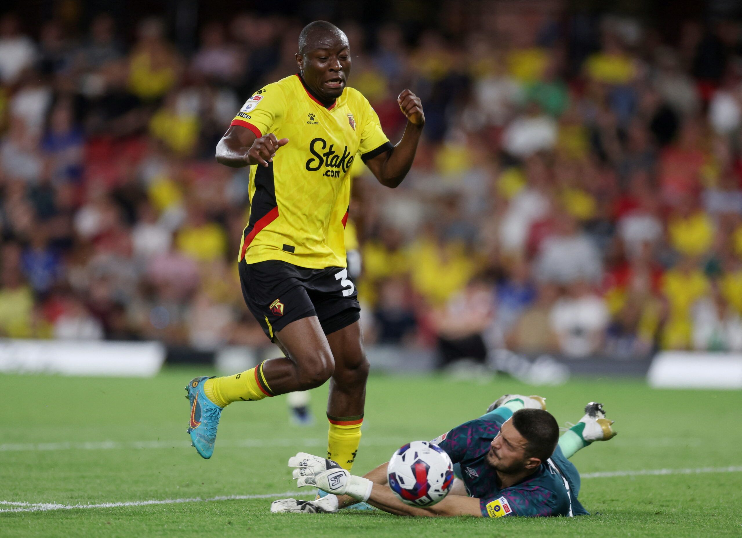 Soccer Football - Championship - Watford v Burnley - Vicarage Road, Watford, Britain - August 12, 2022 Watford's Edo Kayembe in action with Burnley's Arijanet Muric Action Images/Paul Childs  EDITORIAL USE ONLY. No use with unauthorized audio, video, data, fixture lists, club/league logos or 