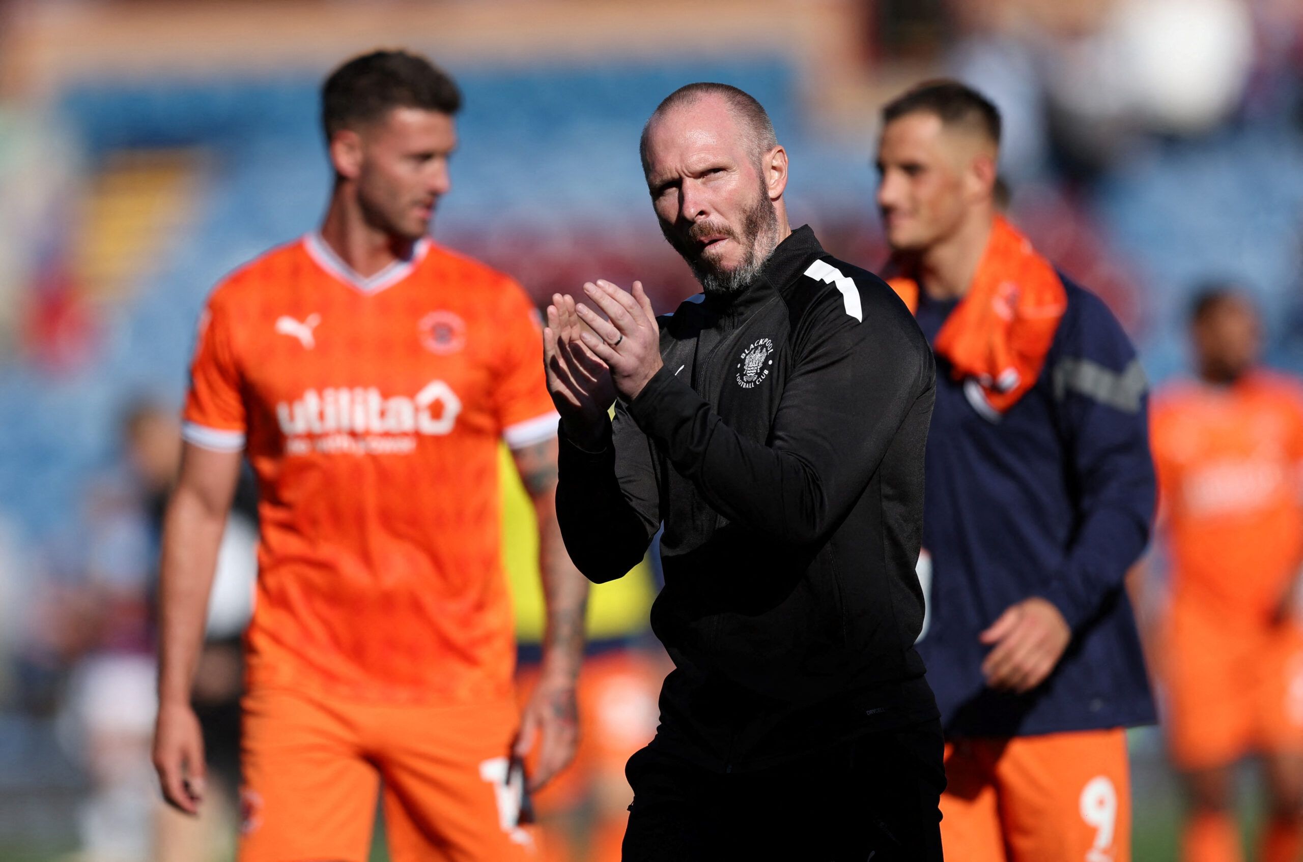 Soccer Football - Championship - Burnley v Blackpool - Turf Moor, Burnley, Britain - August 20, 2022 Blackpool's manager Michael Appleton applauds fans after the match Action Images/John Clifton  EDITORIAL USE ONLY. No use with unauthorized audio, video, data, fixture lists, club/league logos or 