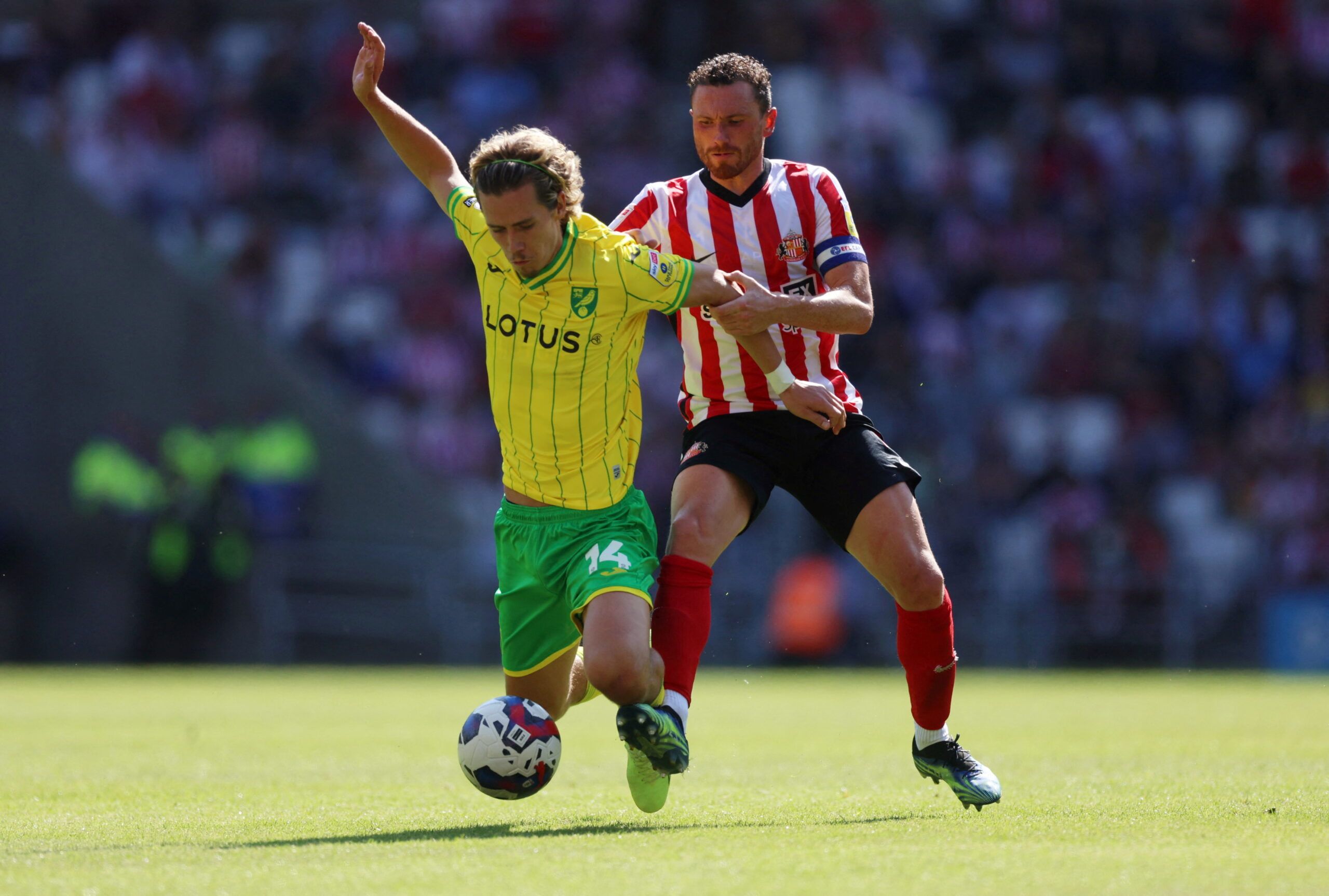 Soccer Football - Championship - Sunderland v Norwich City - Stadium of Light, Sunderland, Britain - August 27, 2022 Norwich City's Todd Cantwell in action with Sunderland?s Corry Evans   Action Images/Lee Smith  EDITORIAL USE ONLY. No use with unauthorized audio, video, data, fixture lists, club/league logos or 