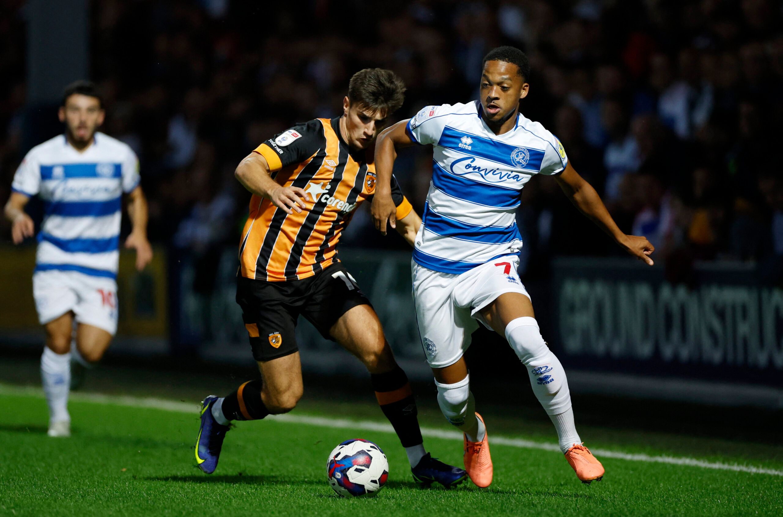 Soccer Football - Championship - Queens Park Rangers v Hull City - Loftus Road, London, Britain - August 30, 2022  Queens Park Rangers' Chris Willock in action with Hull City's Ryan Longman Action Images/John Sibley EDITORIAL USE ONLY. No use with unauthorized audio, video, data, fixture lists, club/league logos or 'live' services. Online in-match use limited to 75 images, no video emulation. No use in betting, games or single club /league/player publications.  Please contact your account repres