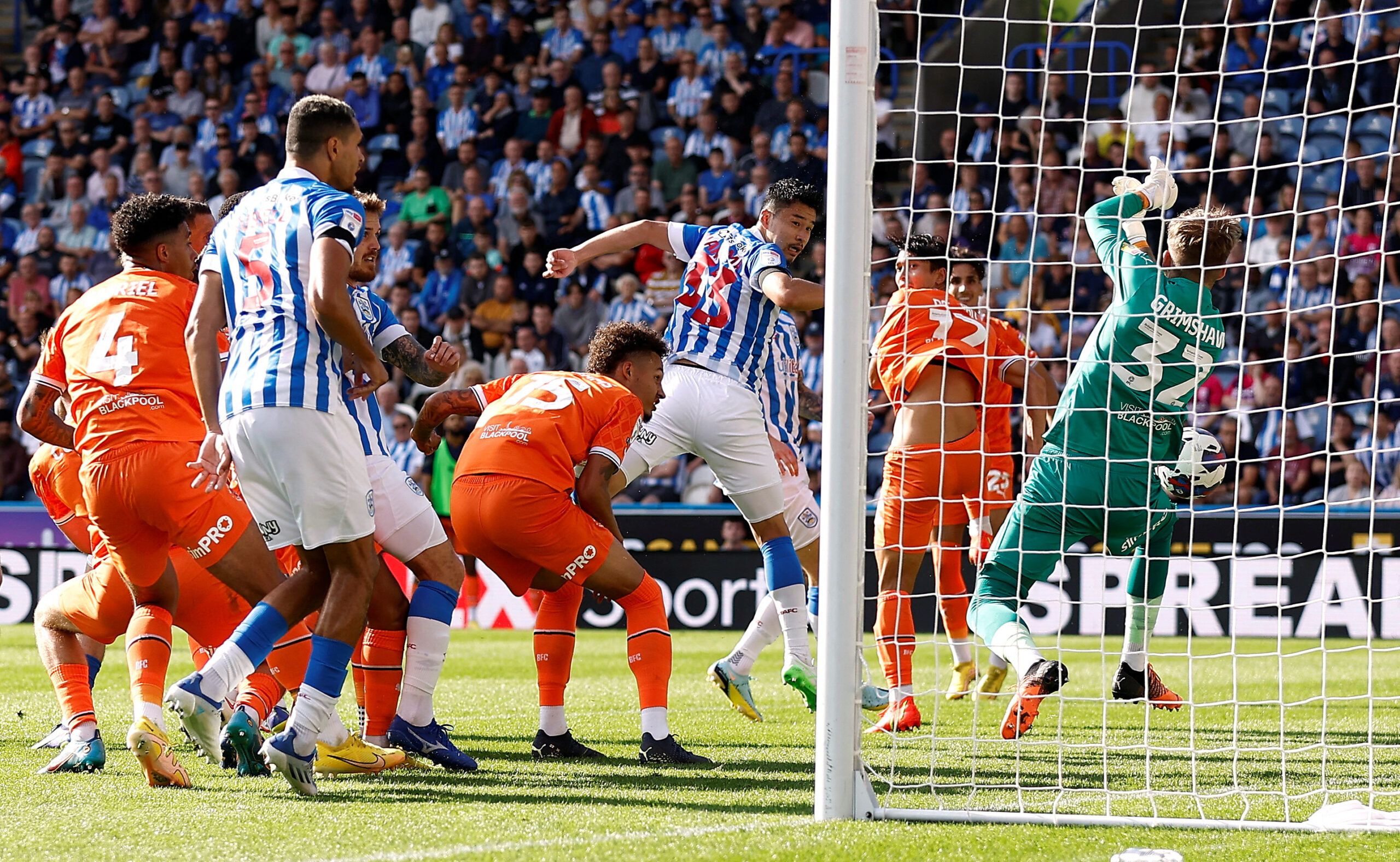 Soccer Football - Championship - Huddersfield Town v Blackpool - John Smith's Stadium, Huddersfield, Britain - September 4, 2022  Huddersfield Town's Yuta Nakayama heads at goal  Action Images/Jason Cairnduff  EDITORIAL USE ONLY. No use with unauthorized audio, video, data, fixture lists, club/league logos or 