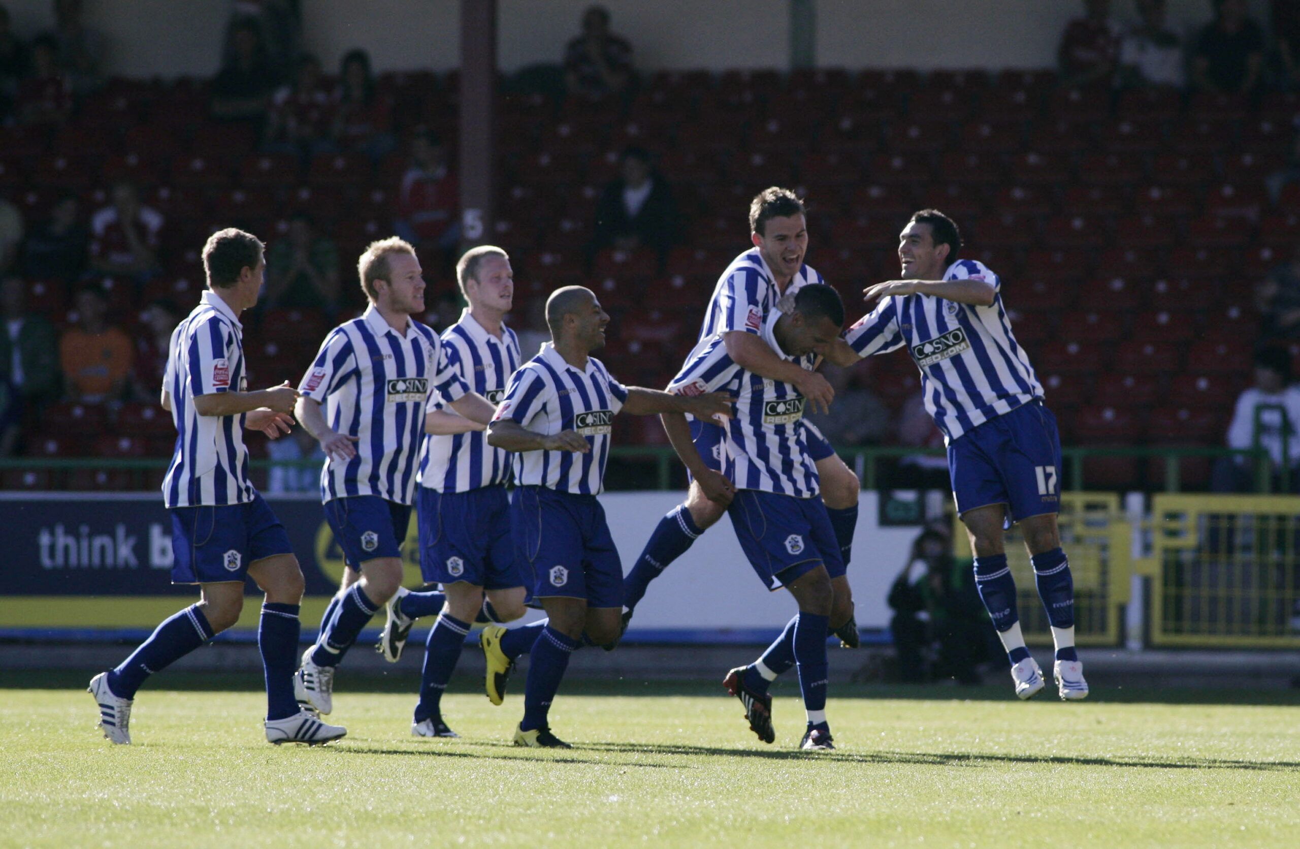 Football - Swindon Town v Huddersfield Town Coca-Cola Football League One - The County Ground - 11/10/08 
Liam Dickinson (2nd R) celebrates scoring the first goal for Huddersfield Town with team mates 
Mandatory Credit: Action Images / Peter Cziborra 
Livepic