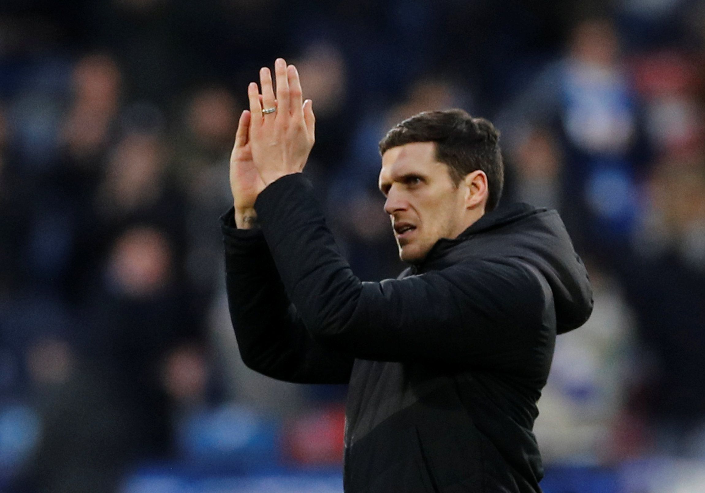 Soccer Football - Premier League - Huddersfield Town v Manchester City - John Smith's Stadium, Huddersfield, Britain - January 20, 2019  Huddersfield Town caretaker manager Mark Hudson applauds the fans at the end of the match   REUTERS/Phil Noble  EDITORIAL USE ONLY. No use with unauthorized audio, video, data, fixture lists, club/league logos or 