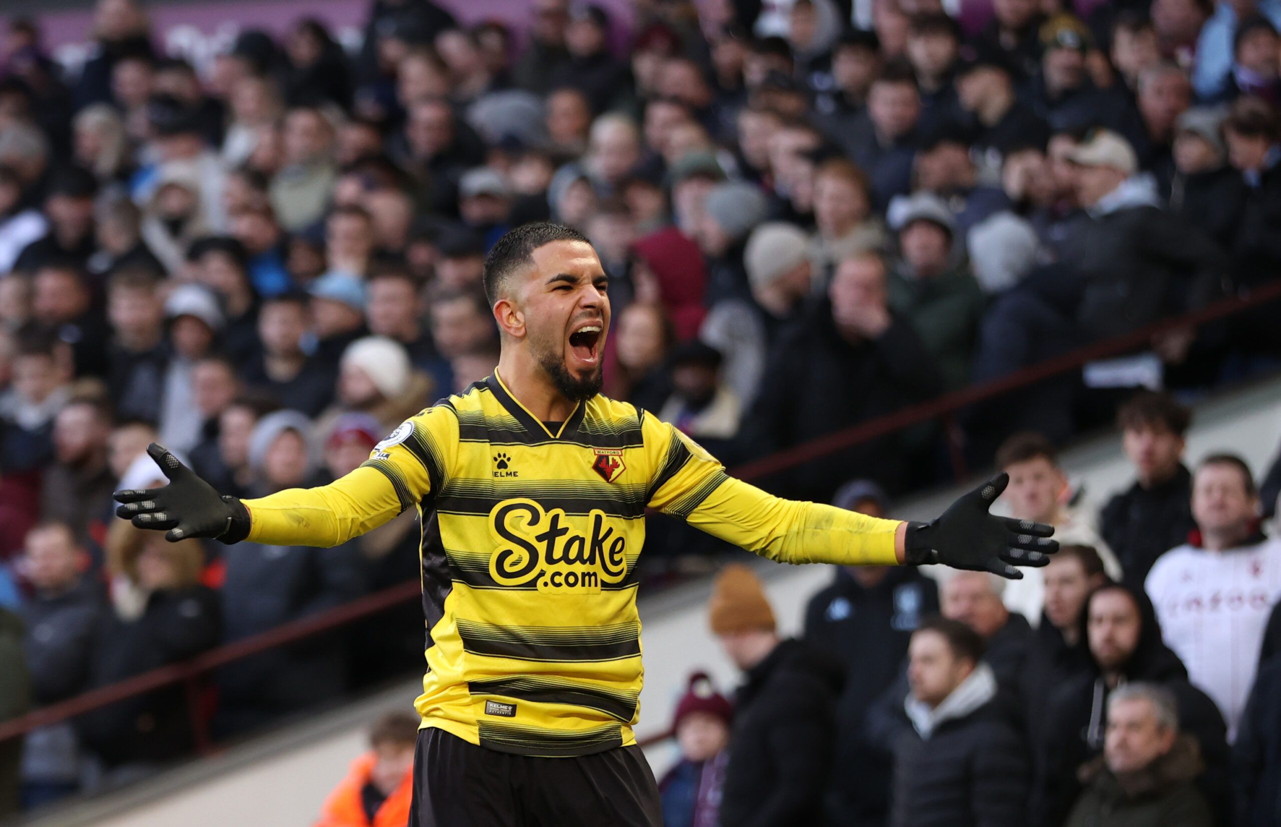 Soccer Football - Premier League - Aston Villa v Watford - Villa Park, Birmingham, Britain - February 19, 2022 Watford's Imran Louza celebrates after teammate Emmanuel Dennis scores their first goal Action Images via Reuters/Molly Darlington EDITORIAL USE ONLY. No use with unauthorized audio, video, data, fixture lists, club/league logos or 'live' services. Online in-match use limited to 75 images, no video emulation. No use in betting, games or single club /league/player publications.  Please c