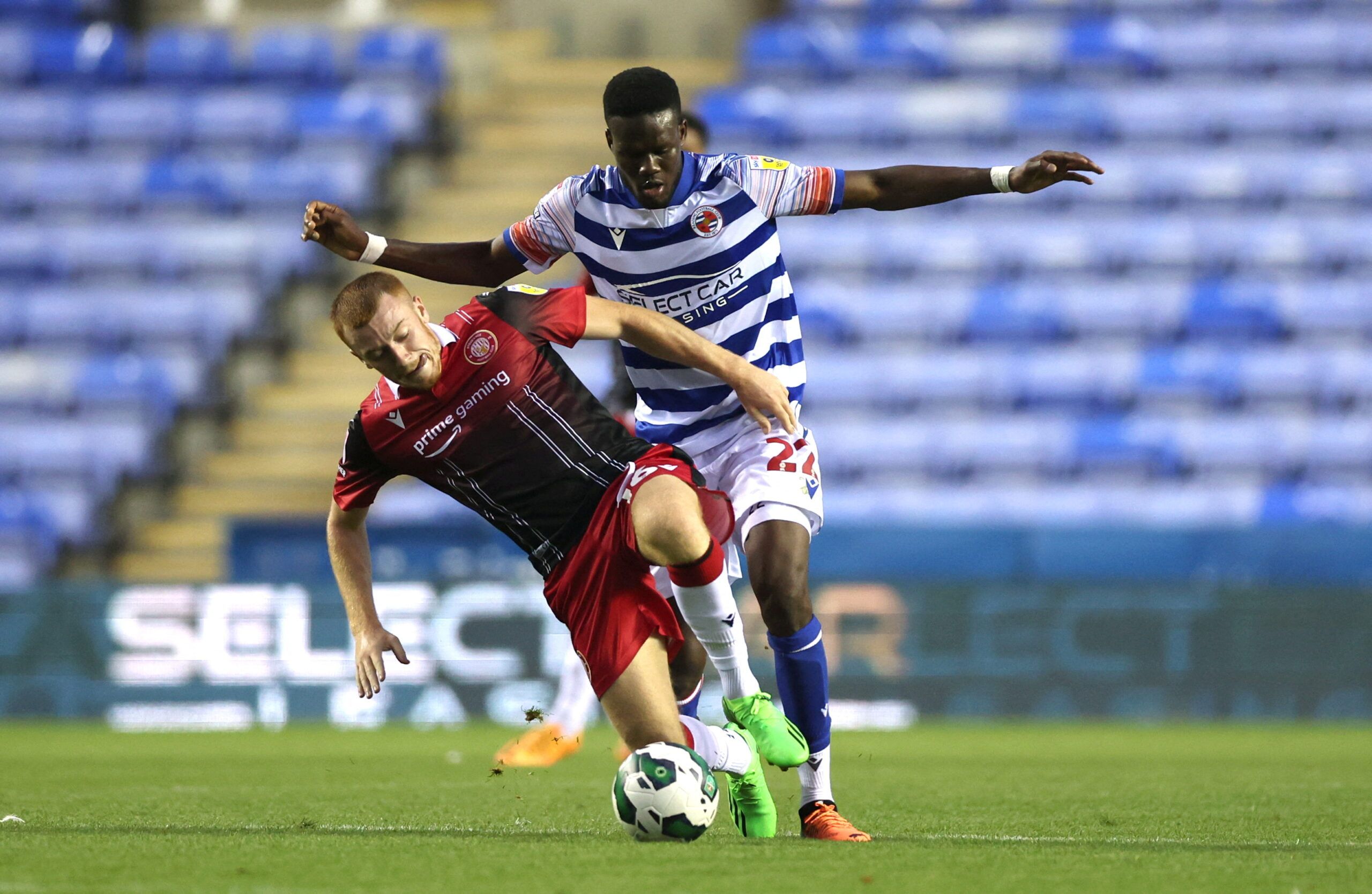 Soccer Football - Carabao Cup - Reading v Stevenage - Madejski Stadium, Reading, Britain - August 9, 2022  Reading's Mamadou Loum in action with Stevenage's Arthur Read Action Images/Matthew Childs  EDITORIAL USE ONLY. No use with unauthorized audio, video, data, fixture lists, club/league logos or 