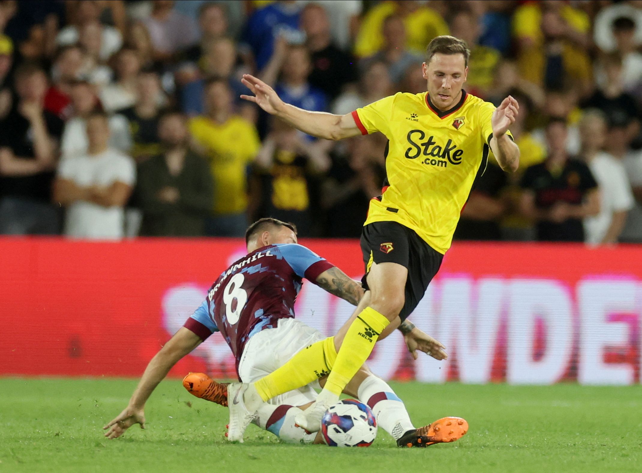 Soccer Football - Championship - Watford v Burnley - Vicarage Road, Watford, Britain - August 12, 2022 Watford's Dan Gosling in action with Burnley's Josh Brownhill Action Images/Paul Childs  EDITORIAL USE ONLY. No use with unauthorized audio, video, data, fixture lists, club/league logos or 
