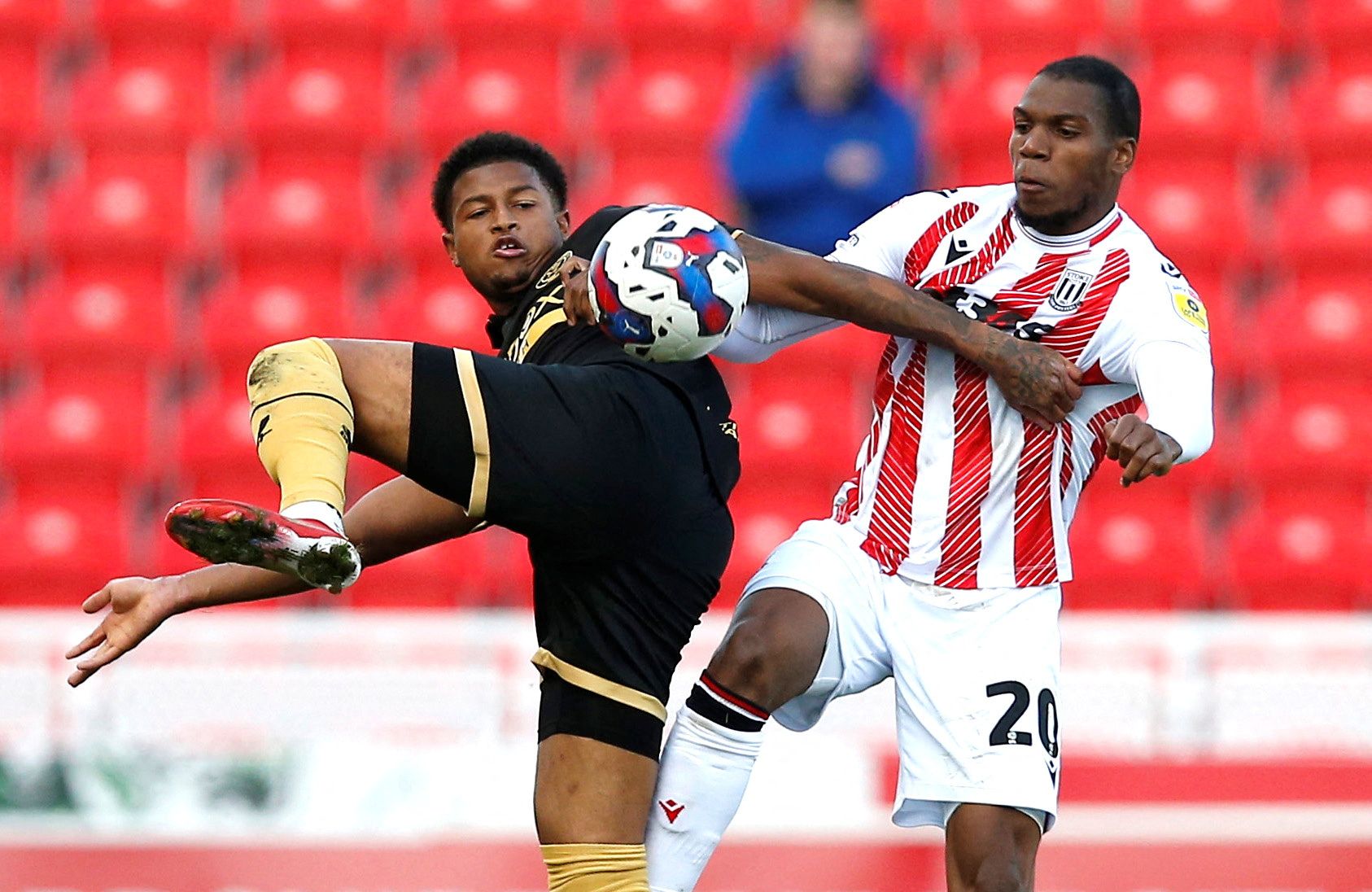 Soccer Football - Championship - Stoke City v Sheffield United - bet365 Stadium, Stoke-on-Trent, Britain - October 8, 2022 Sheffield United's Rhian Brewster in action with Stoke City's Dujon Sterling   Action Images/Craig Brough  EDITORIAL USE ONLY. No use with unauthorized audio, video, data, fixture lists, club/league logos or 