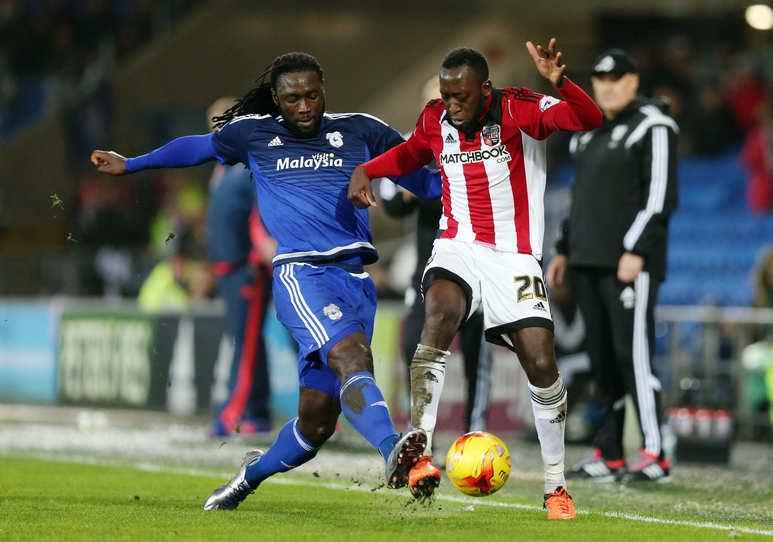 Football Soccer - Cardiff City v Brentford - Sky Bet Football League Championship - Cardiff City Stadium - 15/12/15 
Cardiff's Kenwyne Jones and Brentford's Toumani Diagouraga 
Mandatory Credit: Action Images / Alex Morton 
Livepic 
EDITORIAL USE ONLY. No use with unauthorized audio, video, data, fixture lists, club/league logos or 